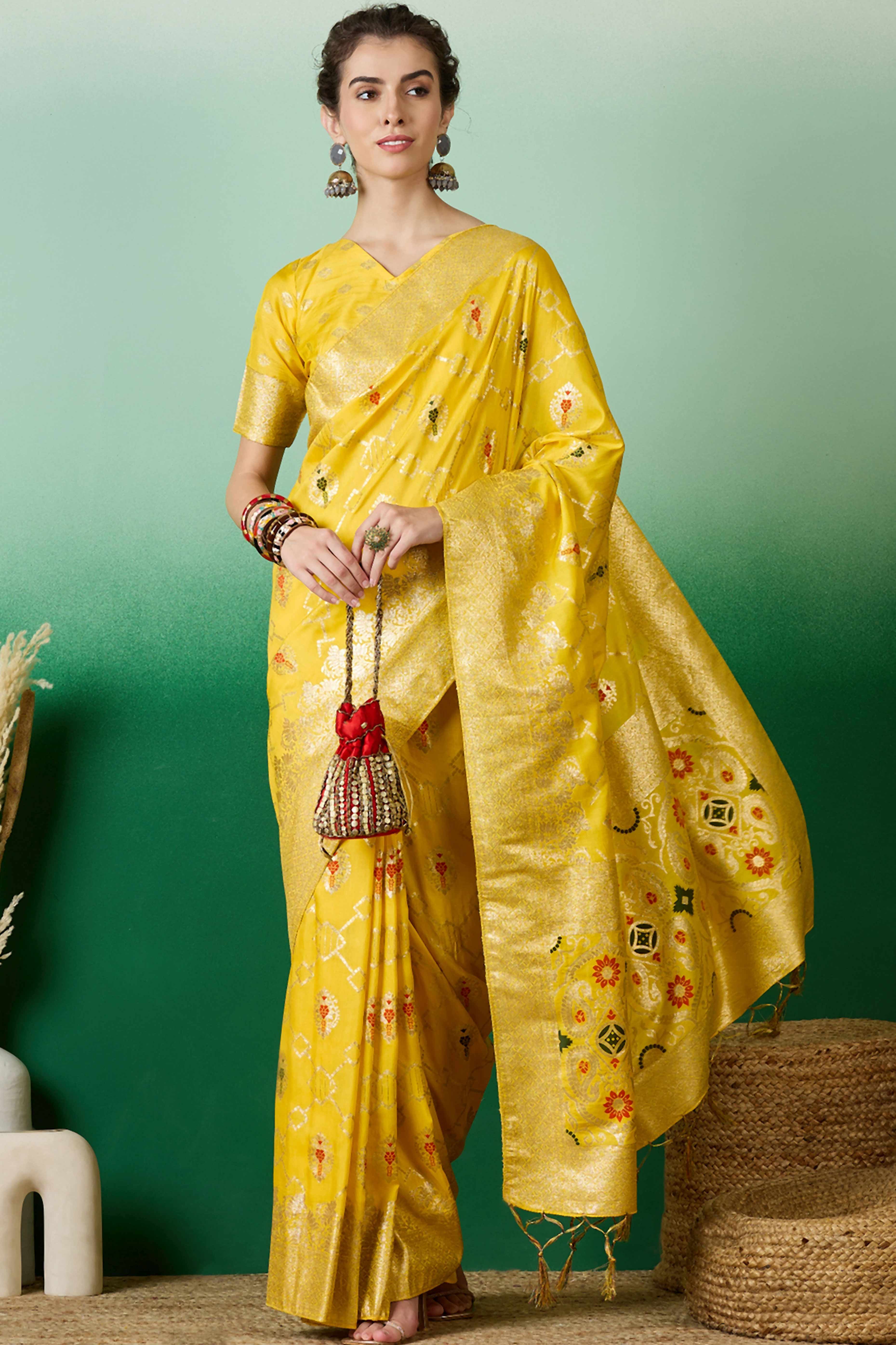 Yellow Zari Woven Staple Cotton Blend Saree With Floral Motifs & Tassel Detailed Pallu