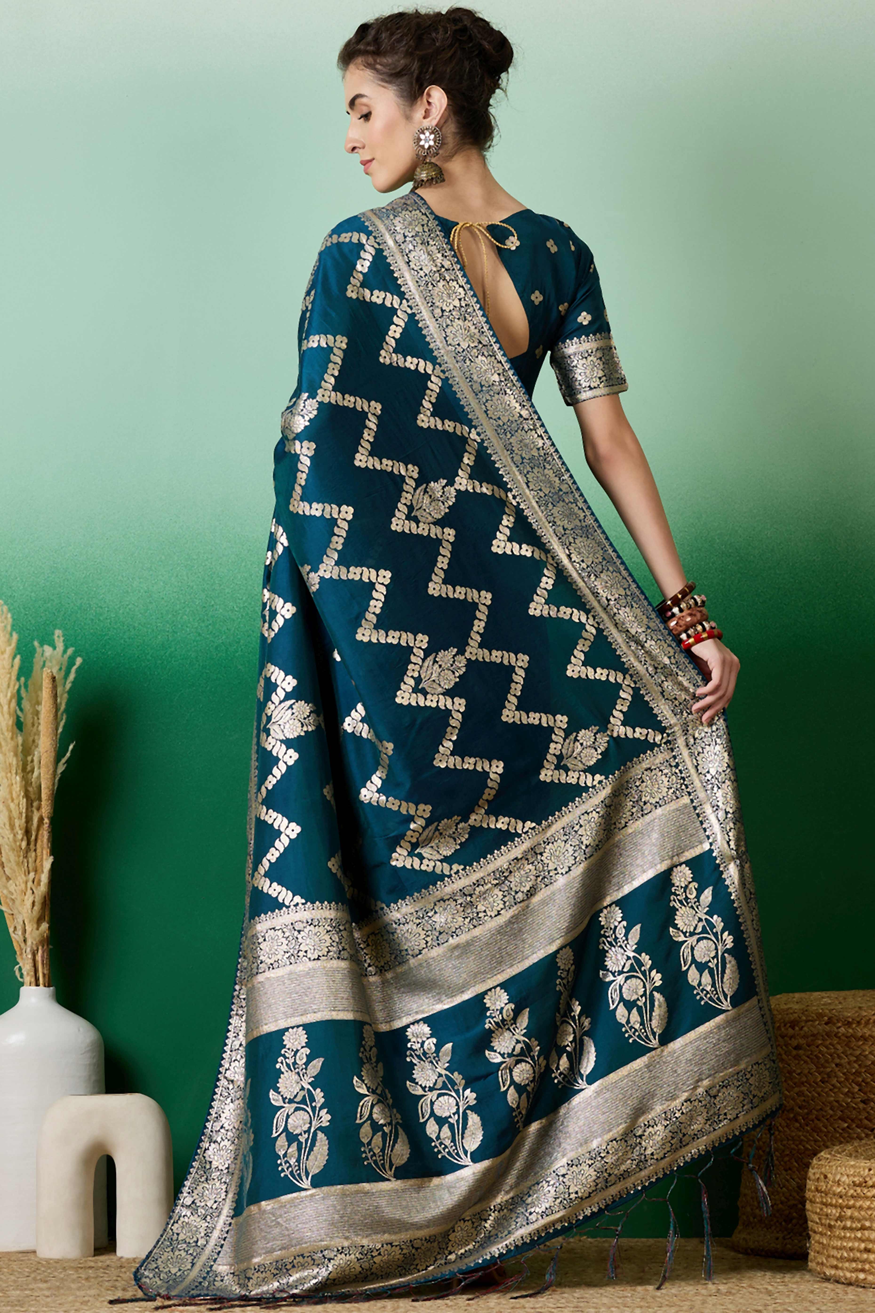 Rich Teal Blue Cotton Blend Jacquard Saree Adorned With Floral Weaving & Graceful Tassel Pallu