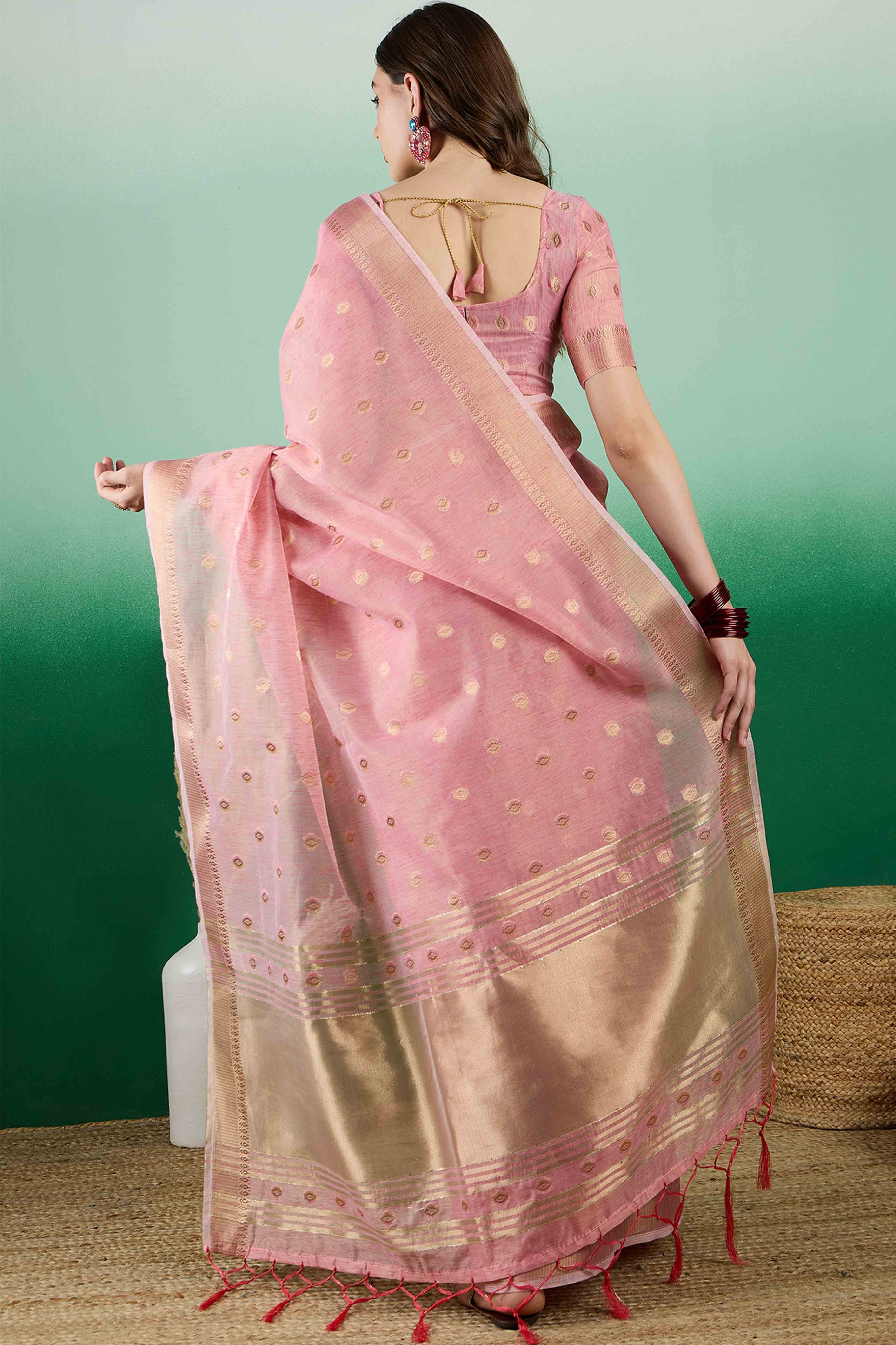 Pink Khadi Organza Saree Embellished With Traditional Zari Work & Tassels