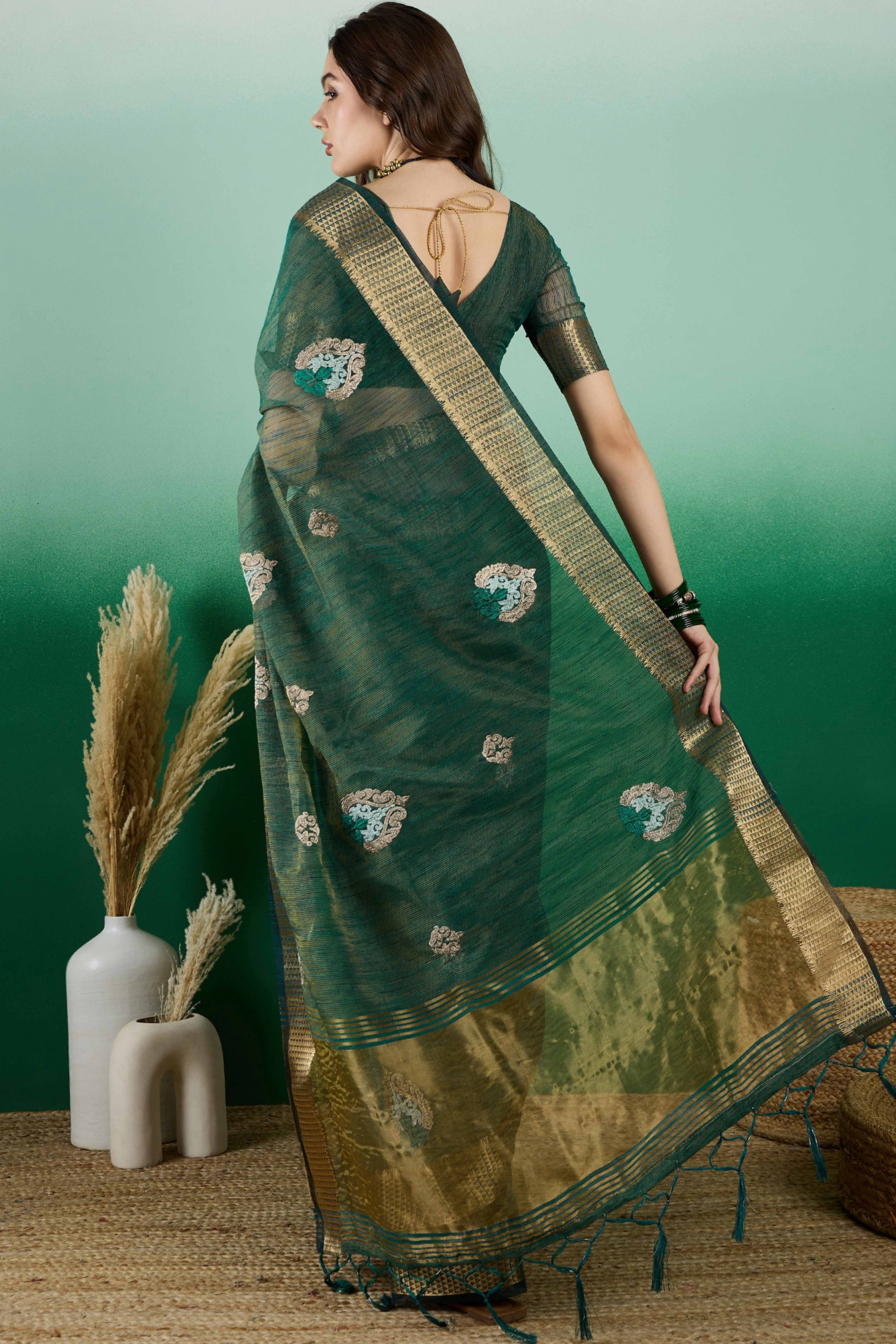 Green Khadi Organza Saree Adorned With Elegant Embroidery & Tassel Pallu