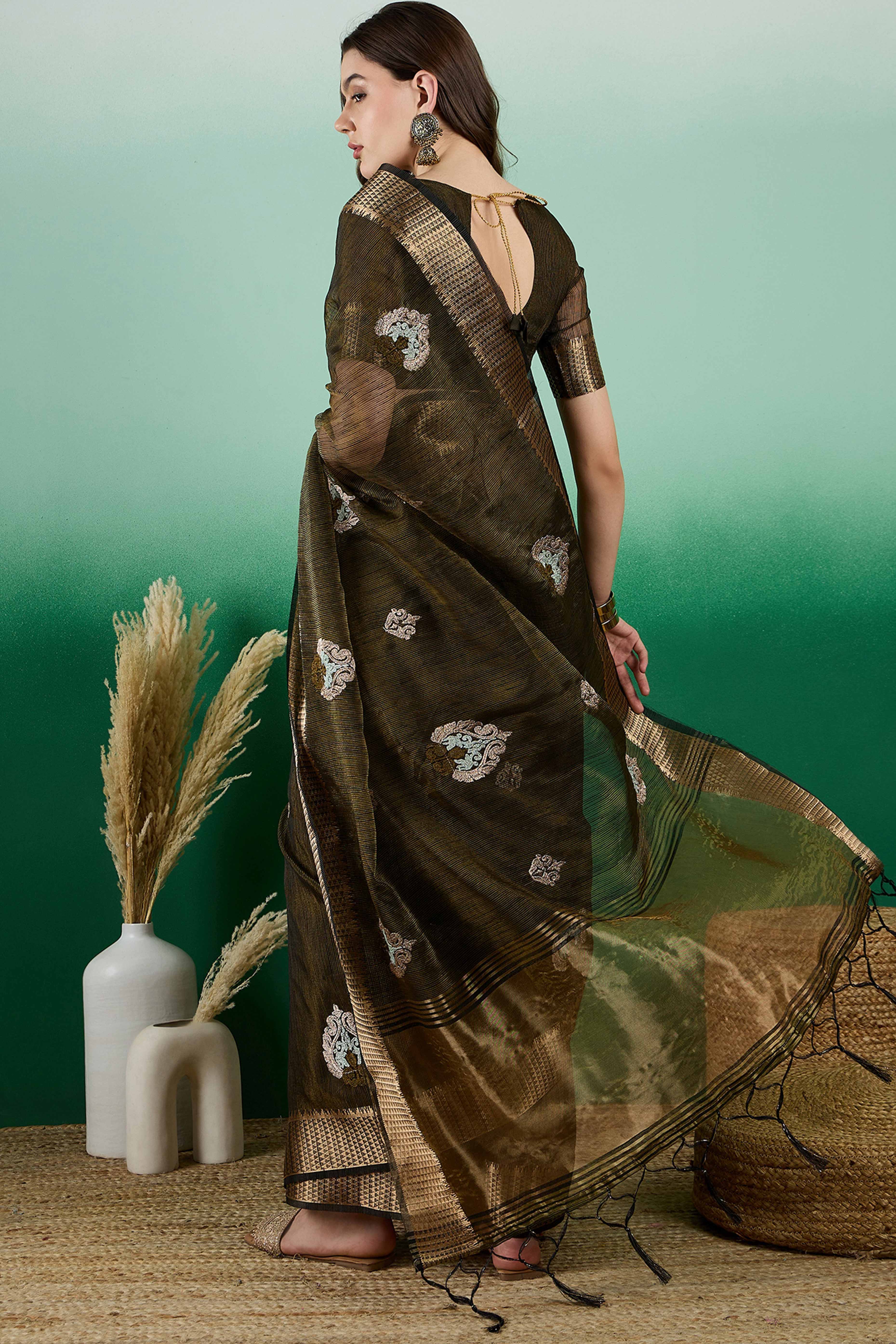Mehendi Green Khadi Organza Saree Adorned With Elegant Embroidery & Tassel Pallu