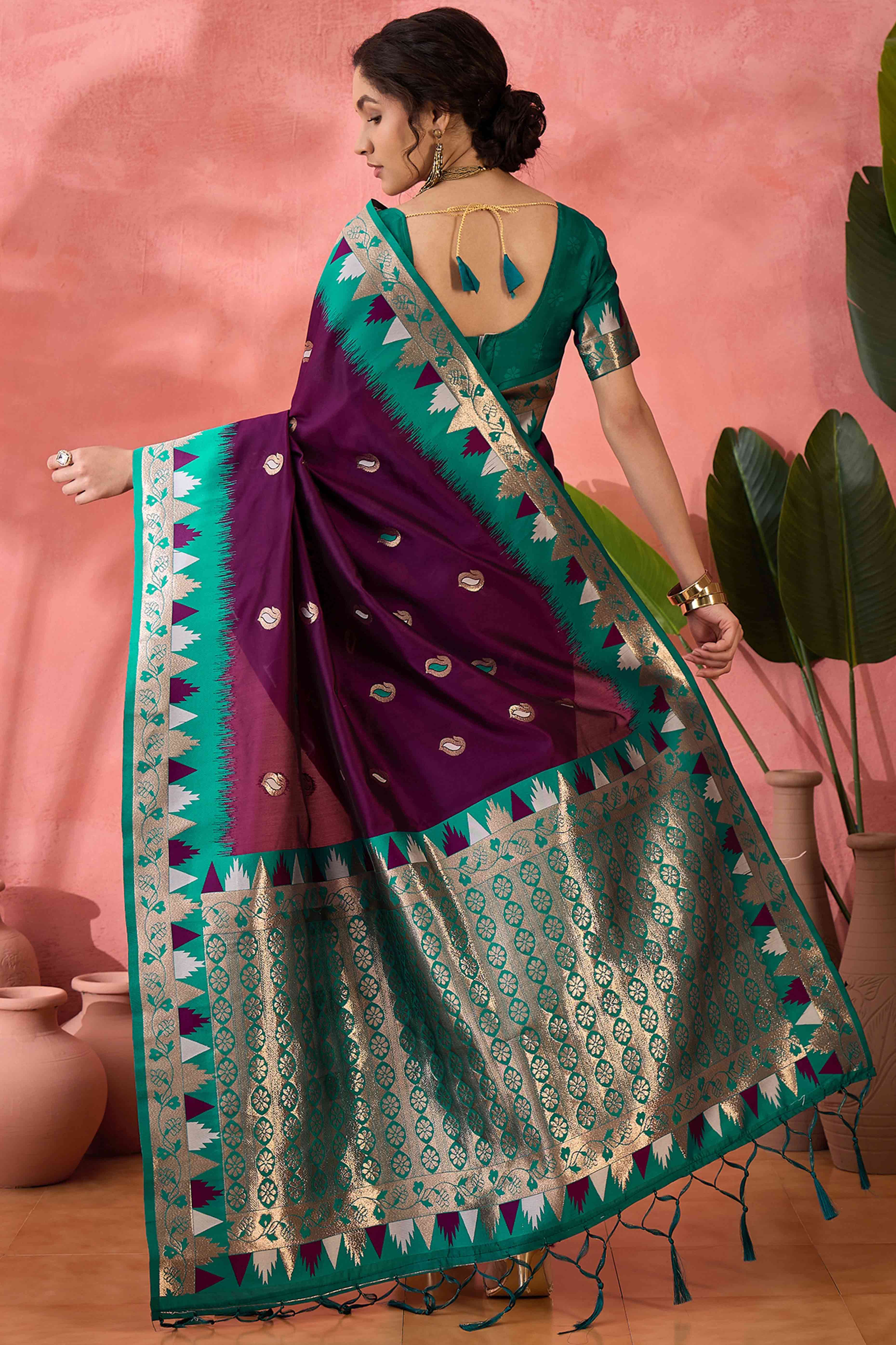 Wine Zari Woven Poly Silk Saree Enhanced With Graceful Tassel Detailing