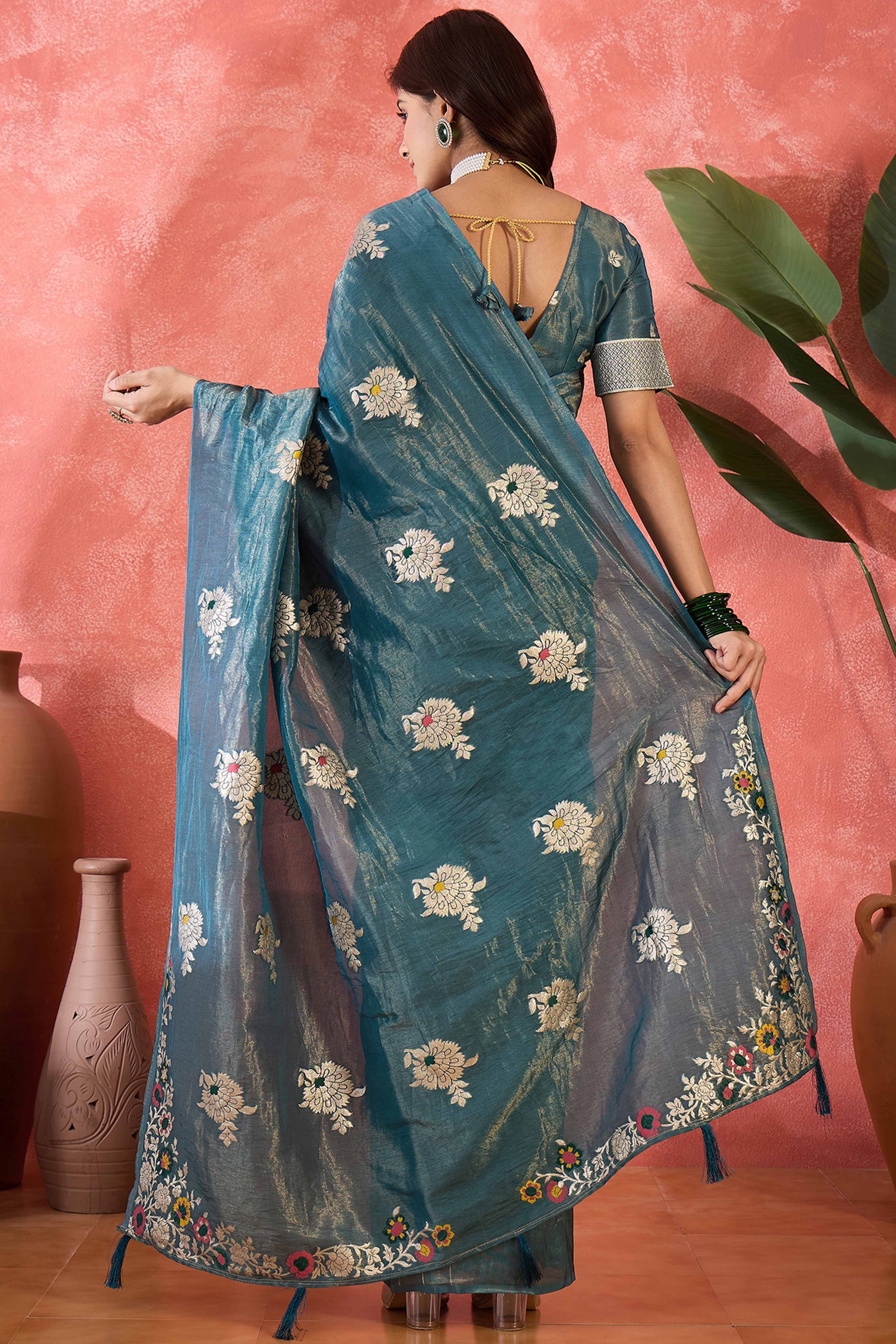 Teal Shimmer Saree Featuring Intricate Floral Zari Weaving & Tassel Finish