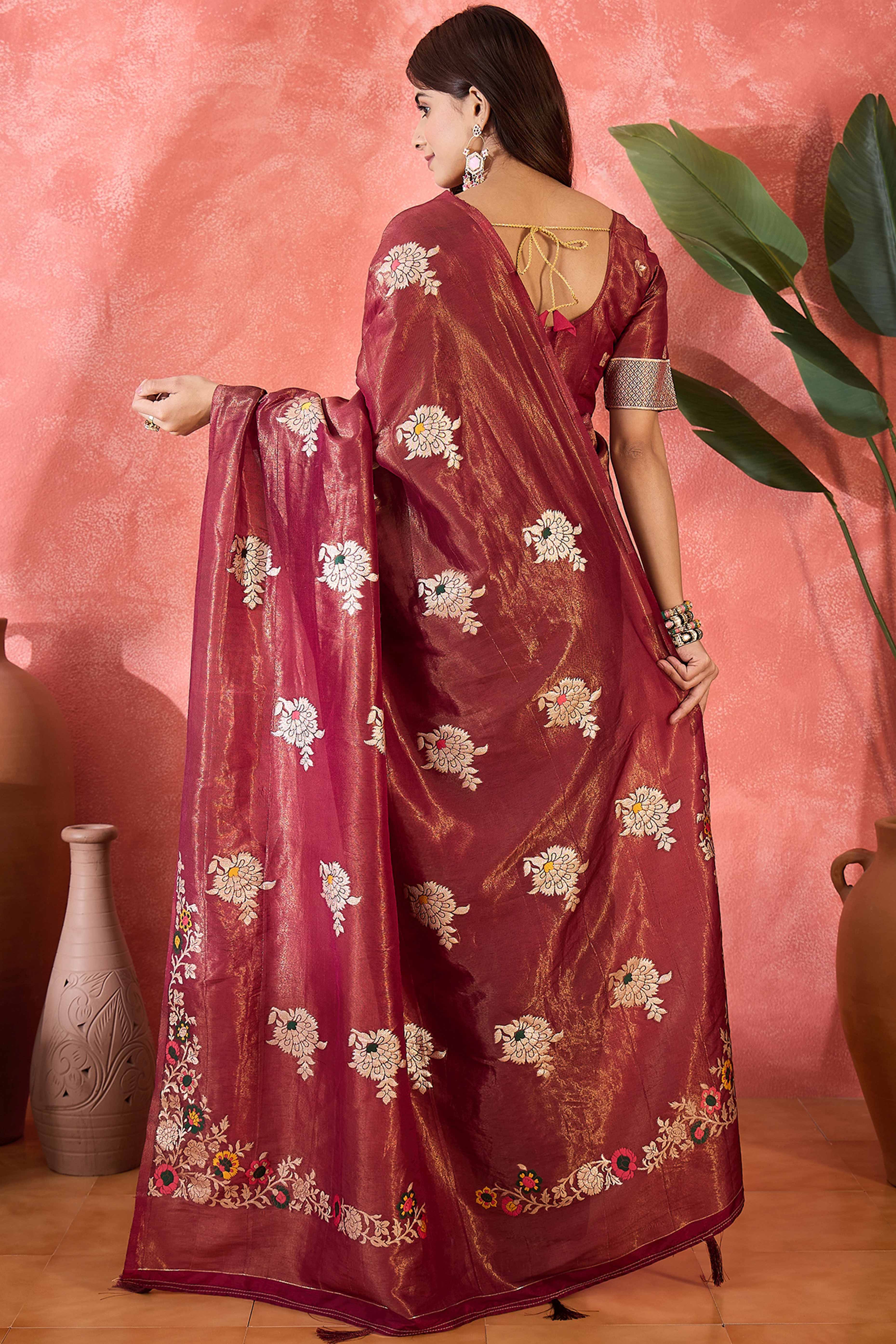 Wine Shimmer Saree Featuring Intricate Floral Zari Weaving & Tassel Finish