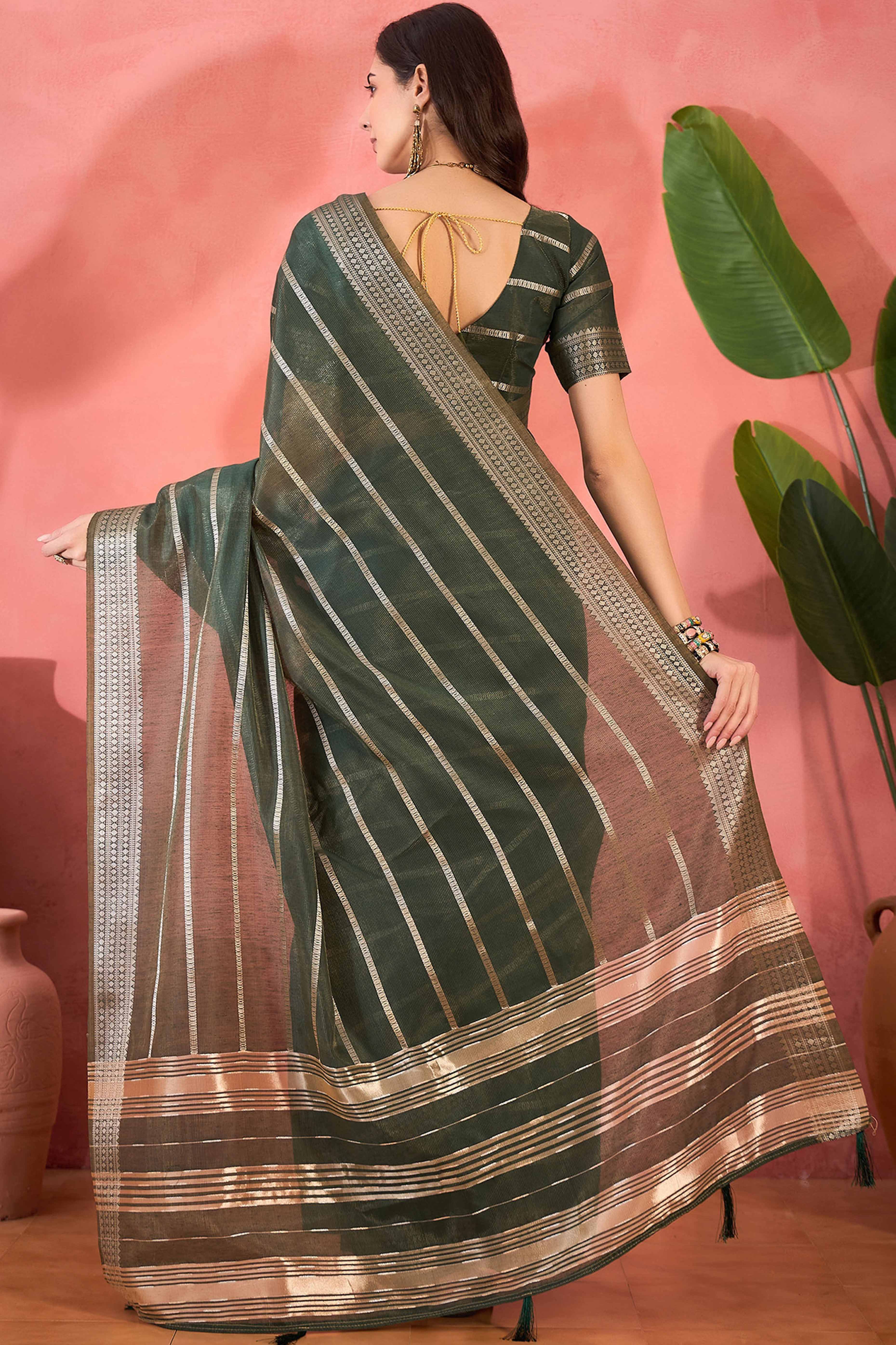 Green Zari Striped Khadi Organza Saree With Graceful Tassel Accents