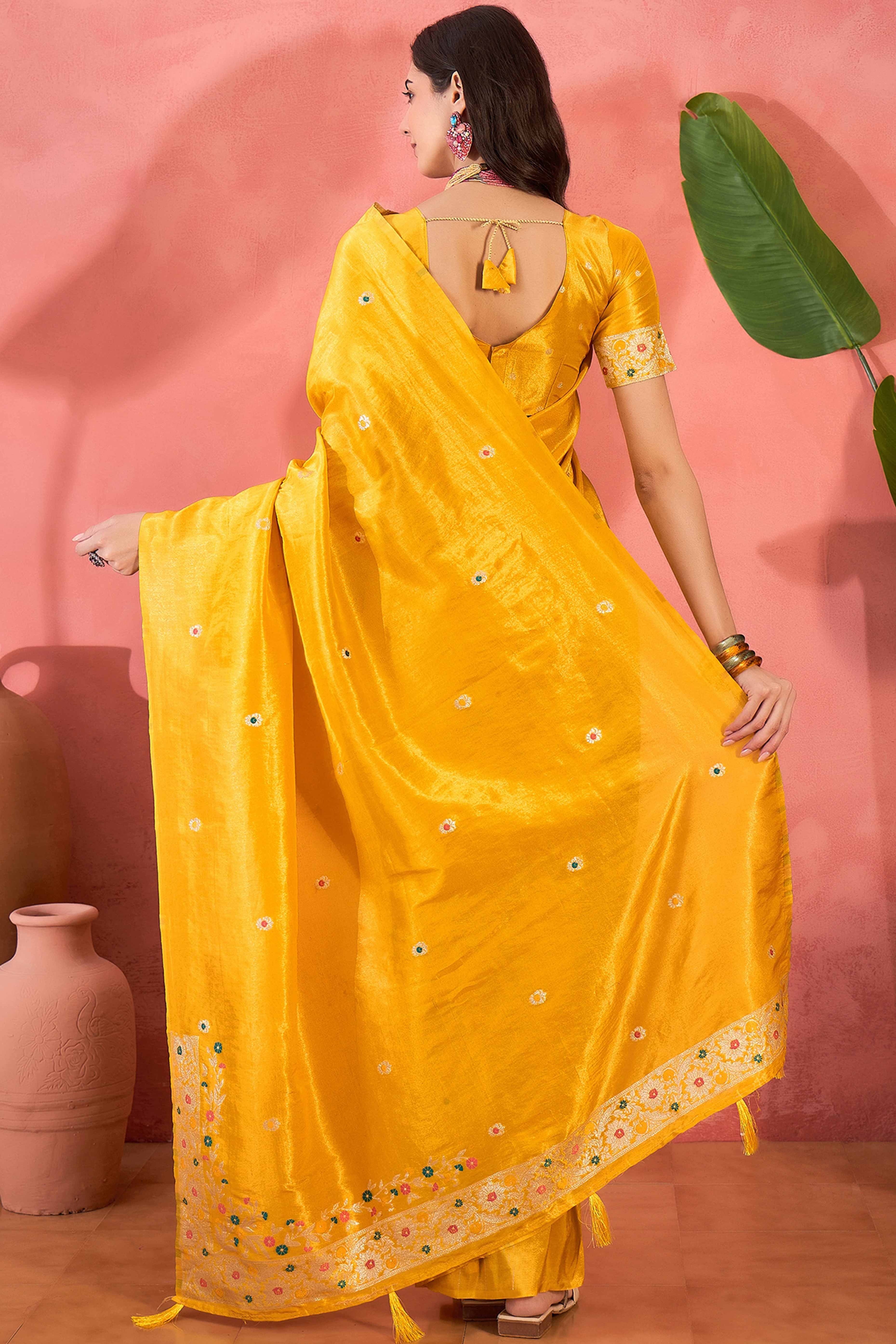 Yellow Zari Woven Shimmer Saree With Floral Motifs & Flowing Tassel Pallu