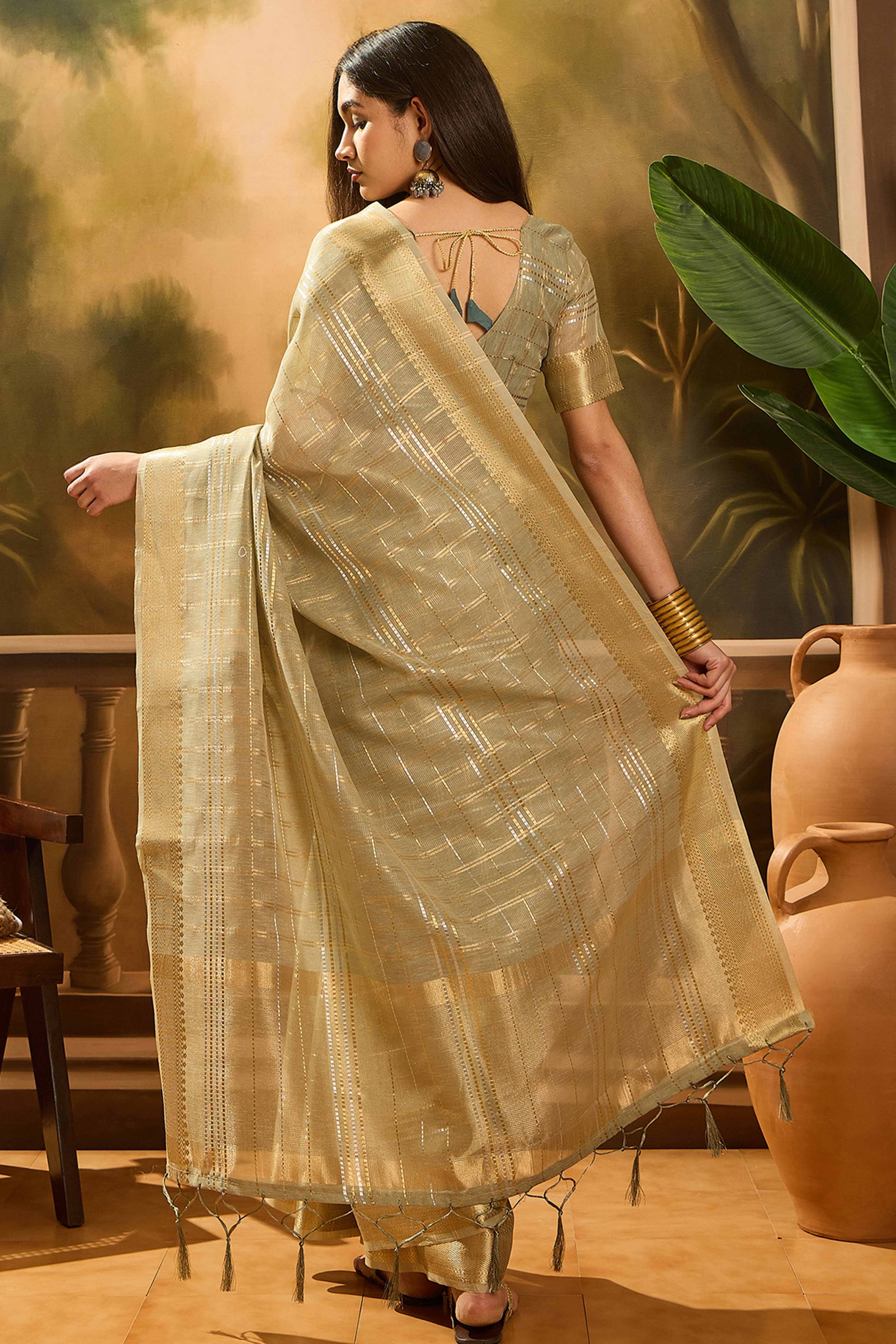 Green Zari Woven Khadi Organza Saree Featuring Classic Checks & Tassel Detailing