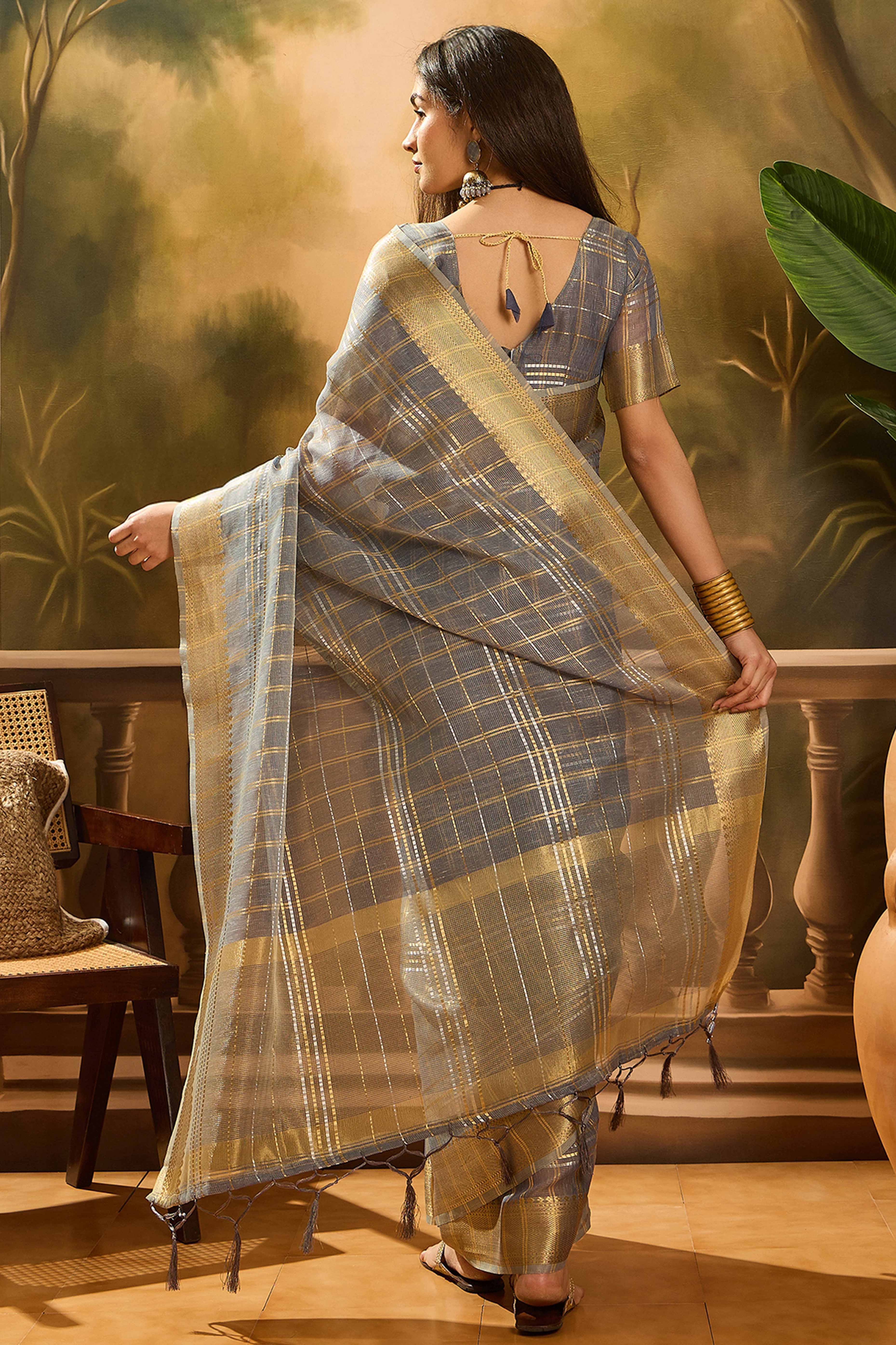 Grey Zari Woven Khadi Organza Saree Featuring Classic Checks & Tassel Detailing