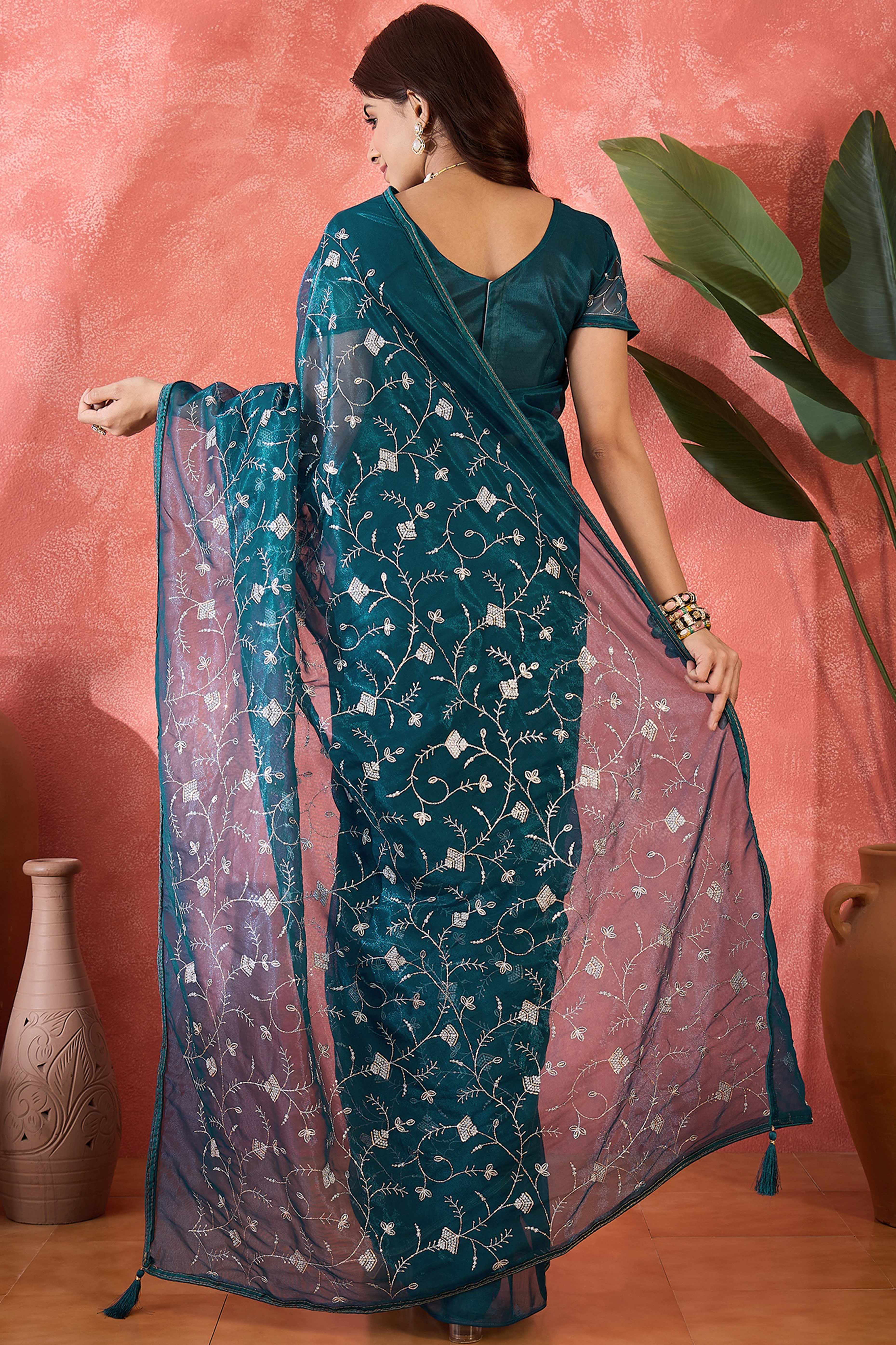 Teal Floral Sequin Embellished Saree In Twill Net With Tassel Accents