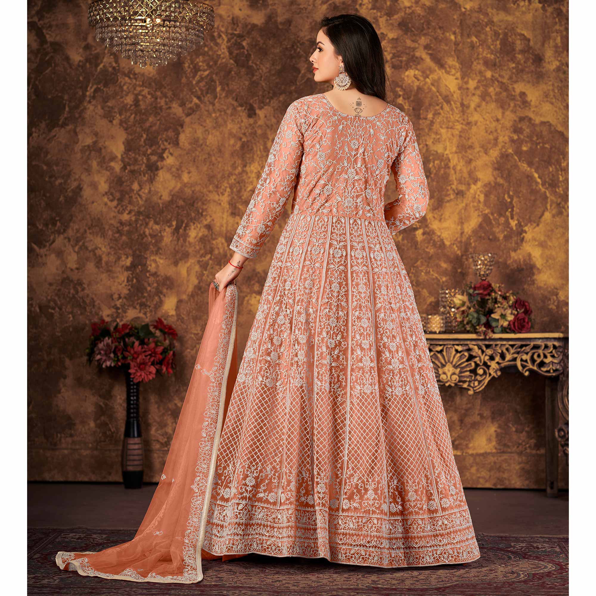Peach Floral Embroidered Net Semi Stitched Dress Material