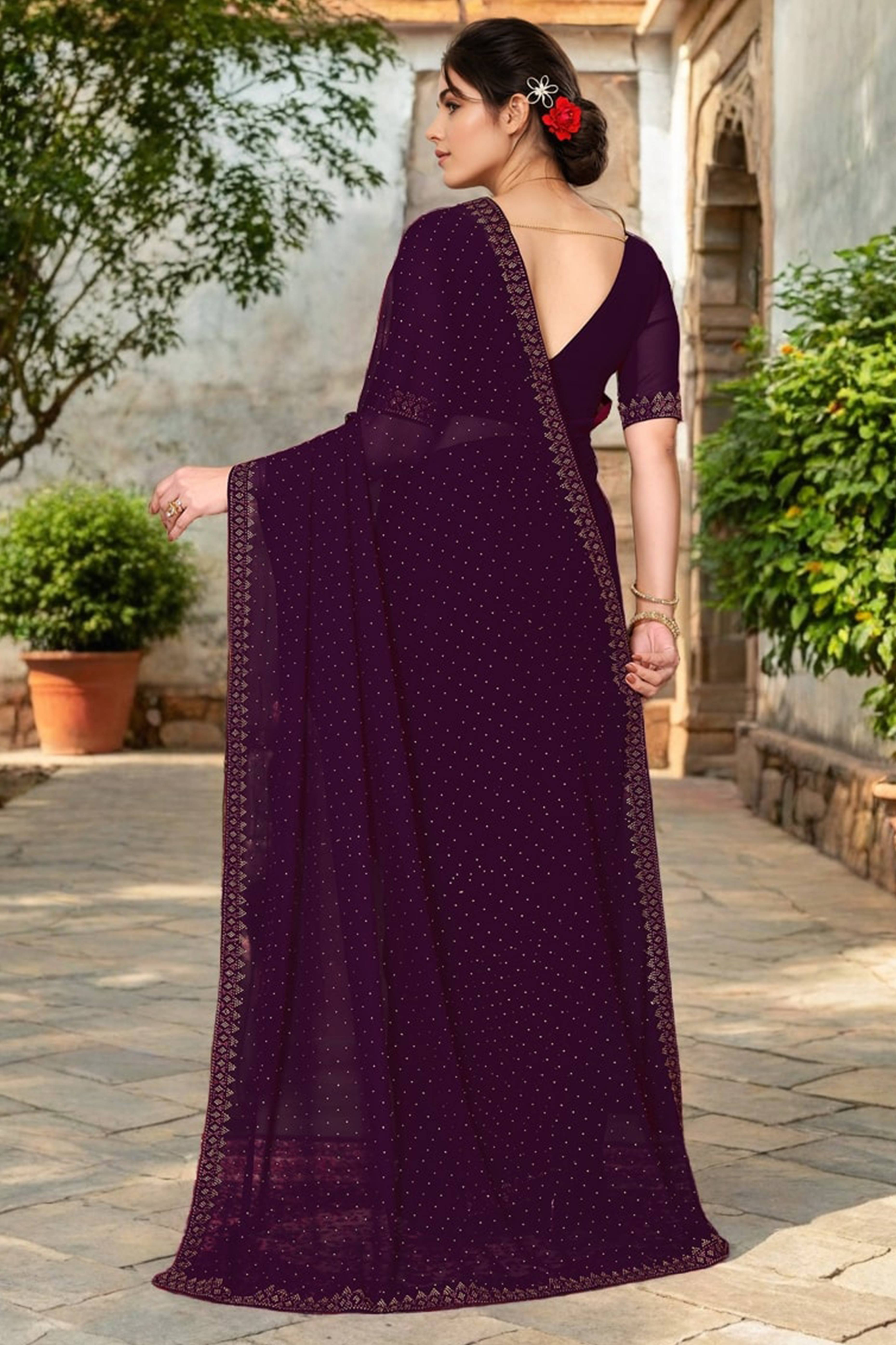 Wine Rangoli Dola Silk Saree Embellished With Diamond Work And Elegant Border