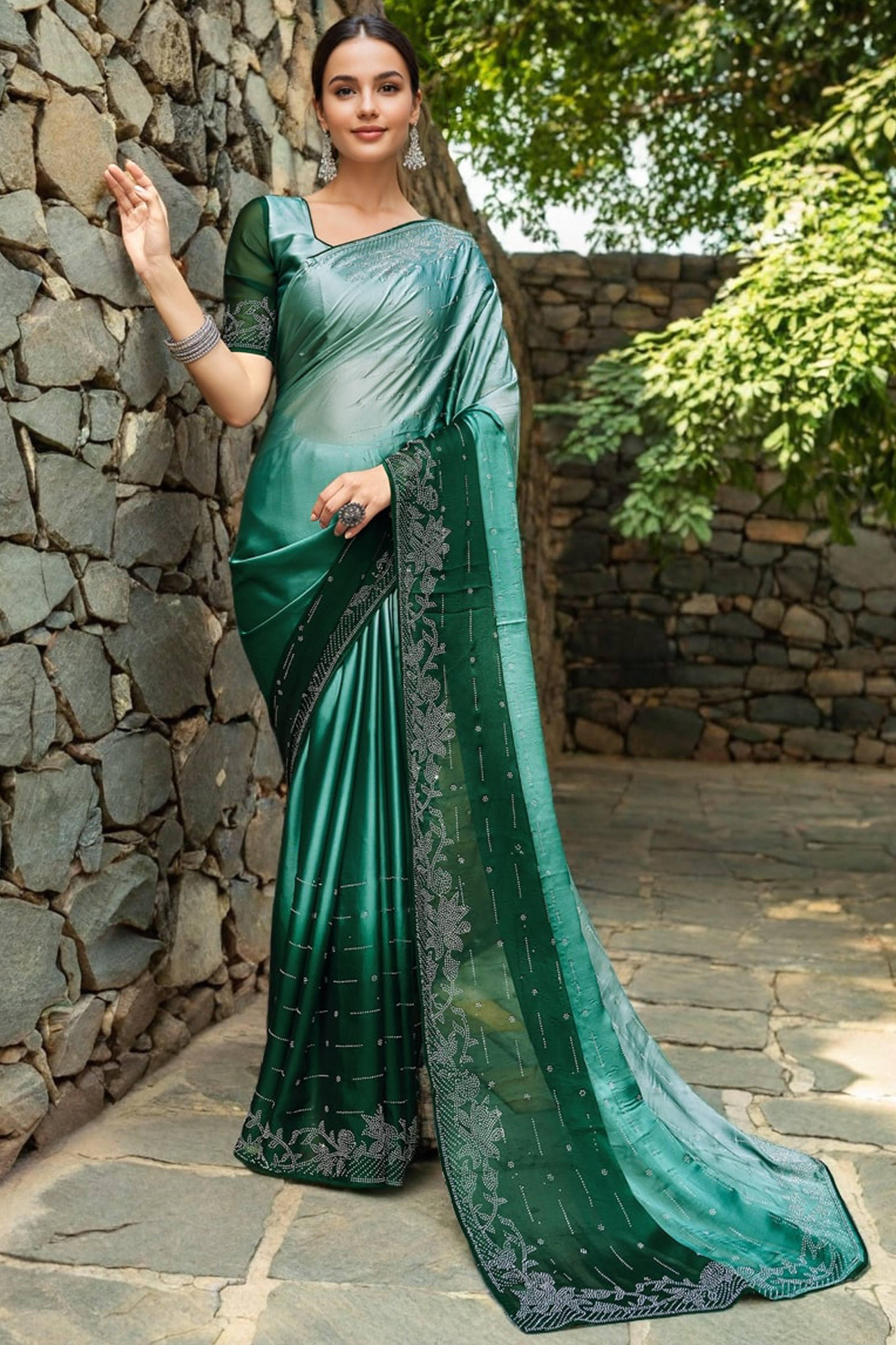 Green Rangoli Dola Silk Saree Adorned With Gleaming Swarovski Work & Classic Floral Border