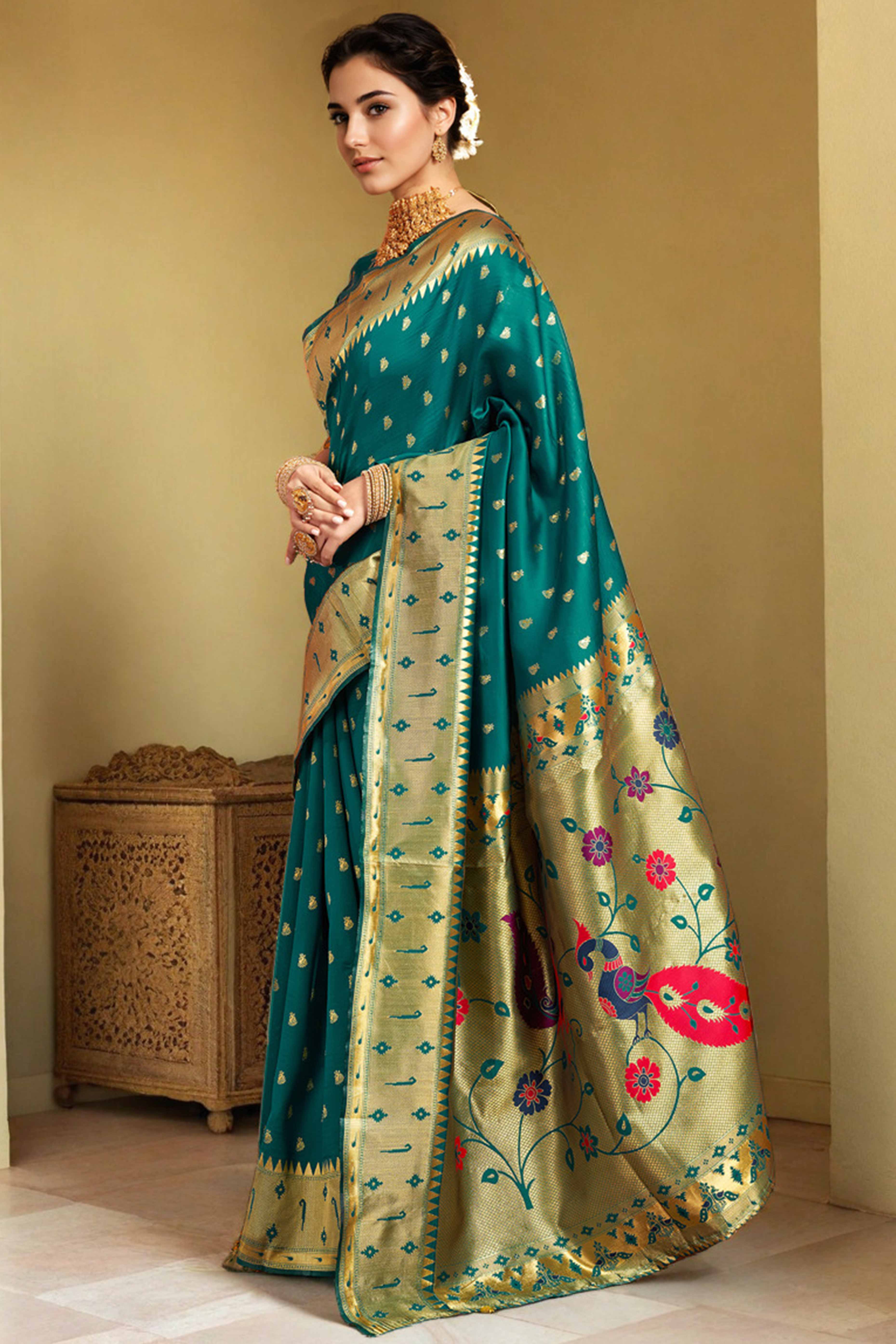 Teal Green Paithani Saree In Silk Blend Highlighted With Zari Woven Peacock & Floral Motifs