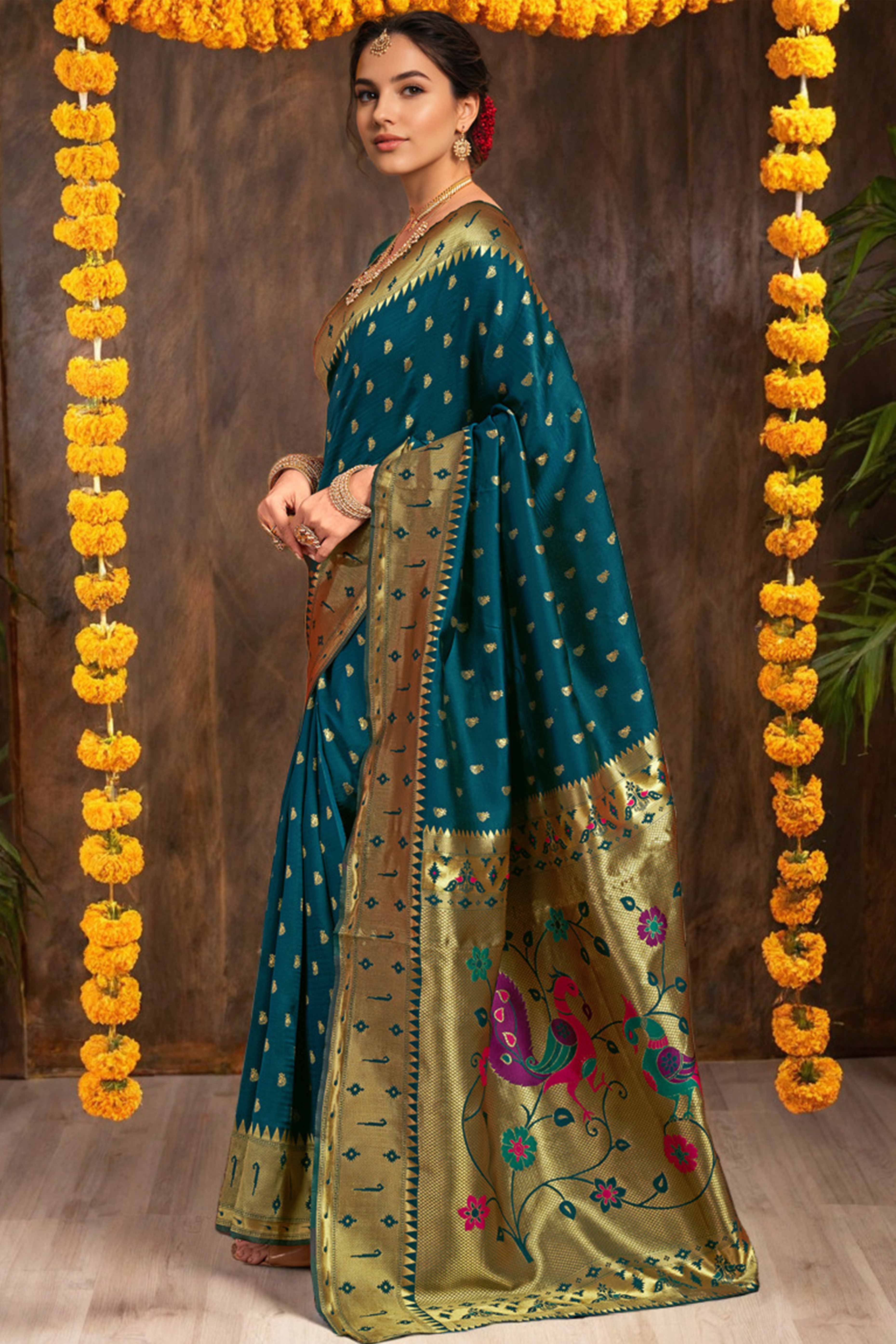Deep Teal Blue Paithani Saree In Silk Blend Highlighted With Zari Woven Peacock & Floral Motifs