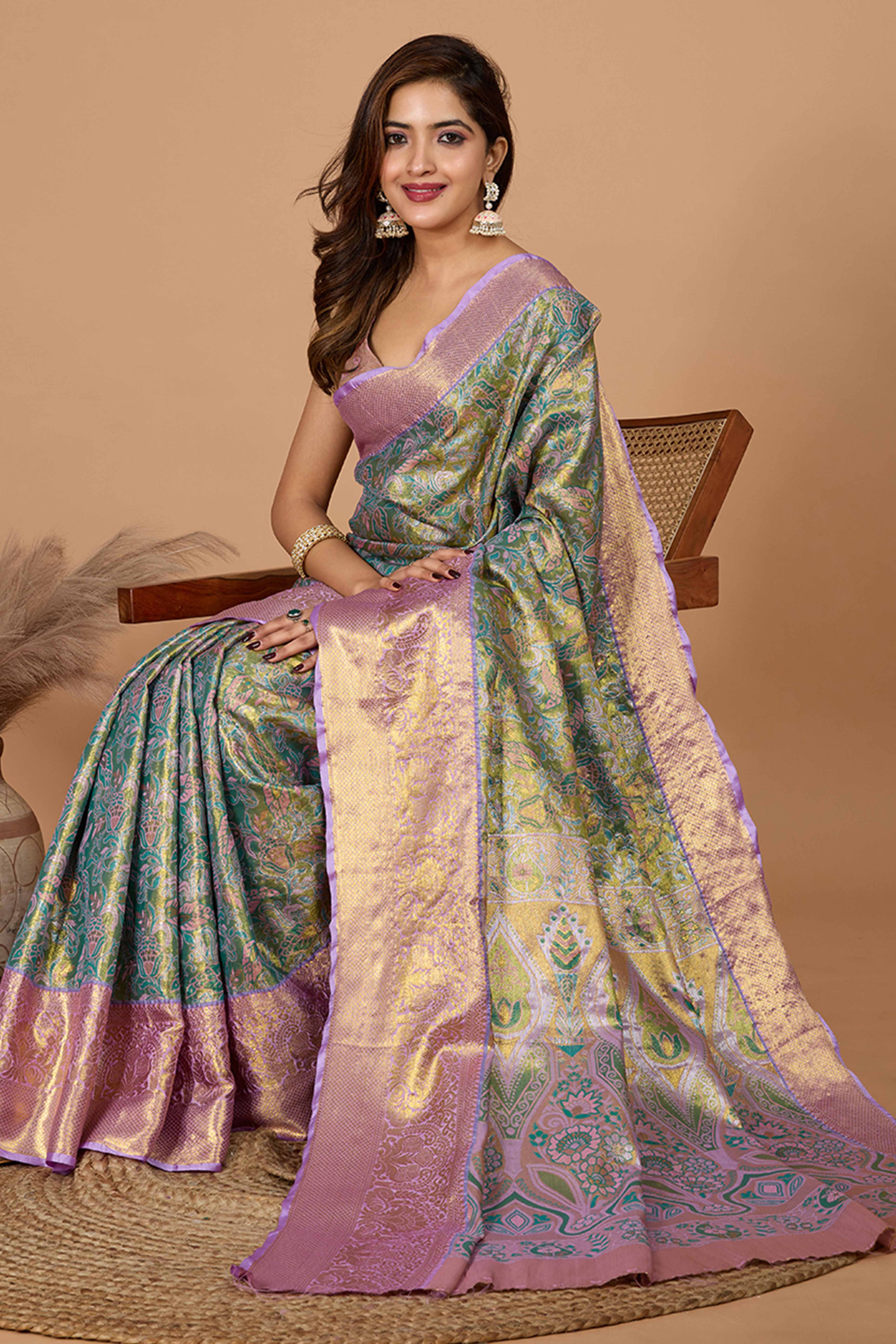Pista Green Kanjivaram Silk Saree Adorned With Exquisite Floral Zari Weaving