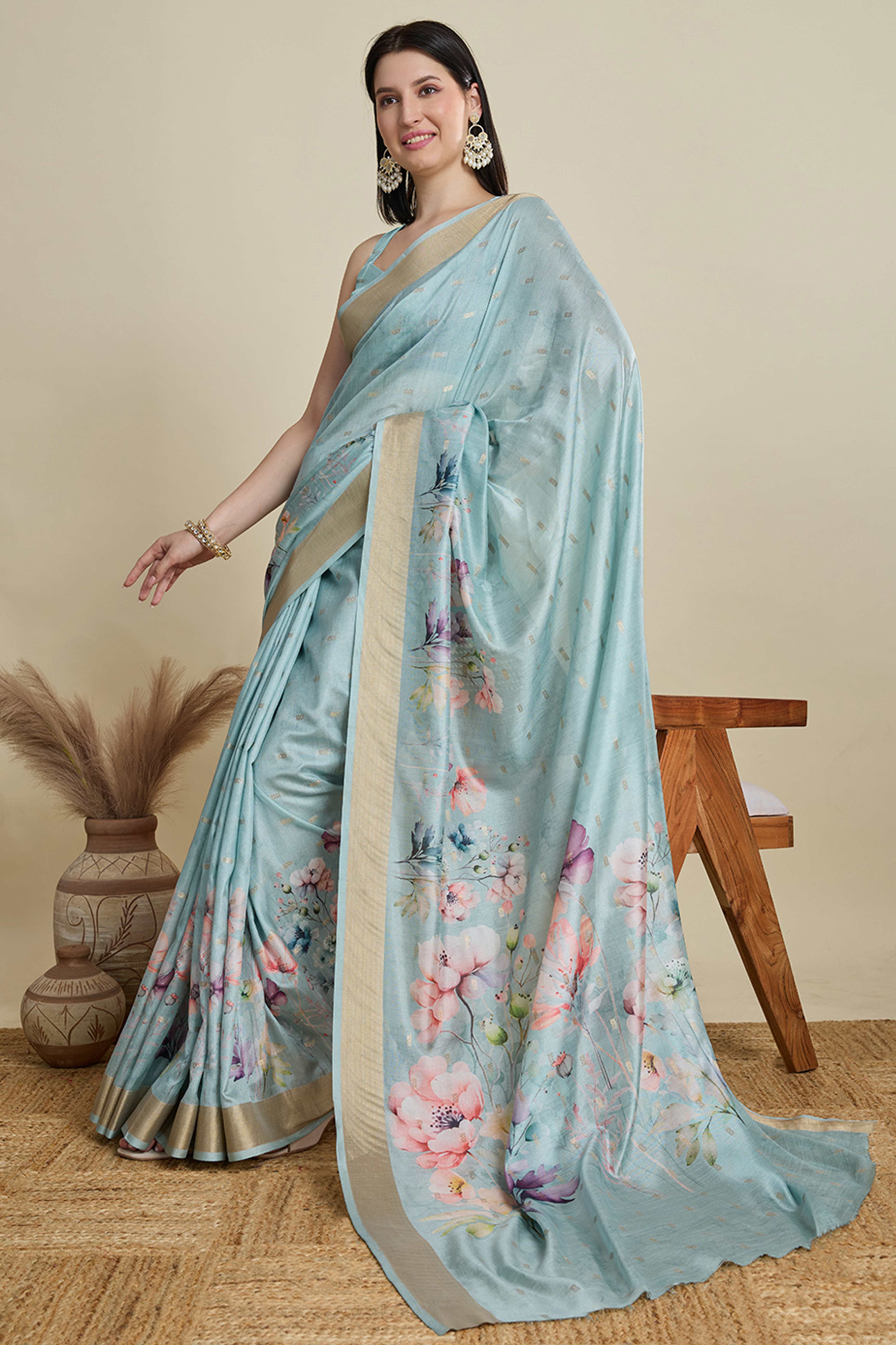 Sky Blue Cotton Blend Saree Featuring Floral Prints and a Festive Zari Border Accent