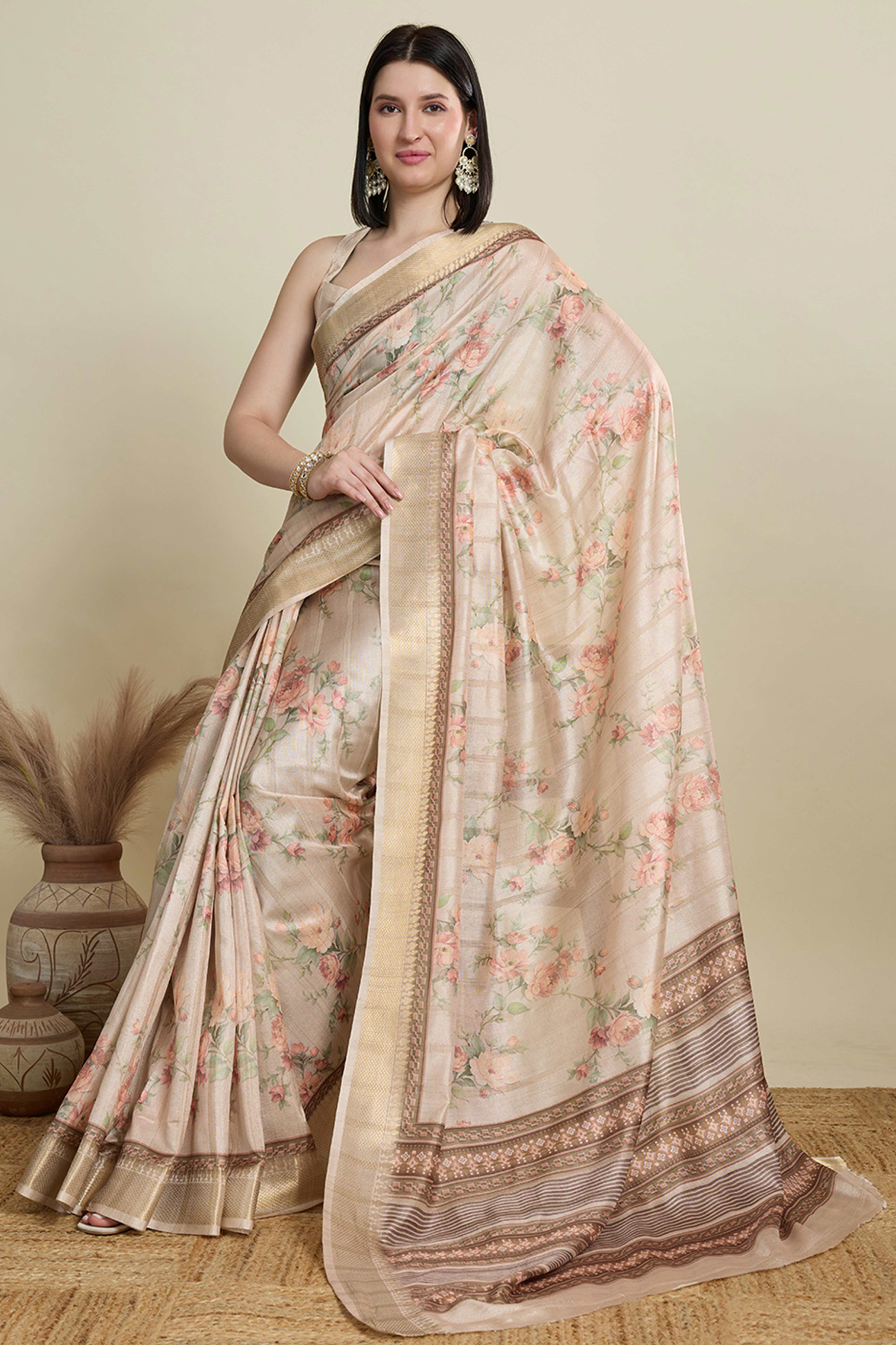 Cream Cotton Blend Saree Featuring Floral Prints and a Festive Zari Border Accent
