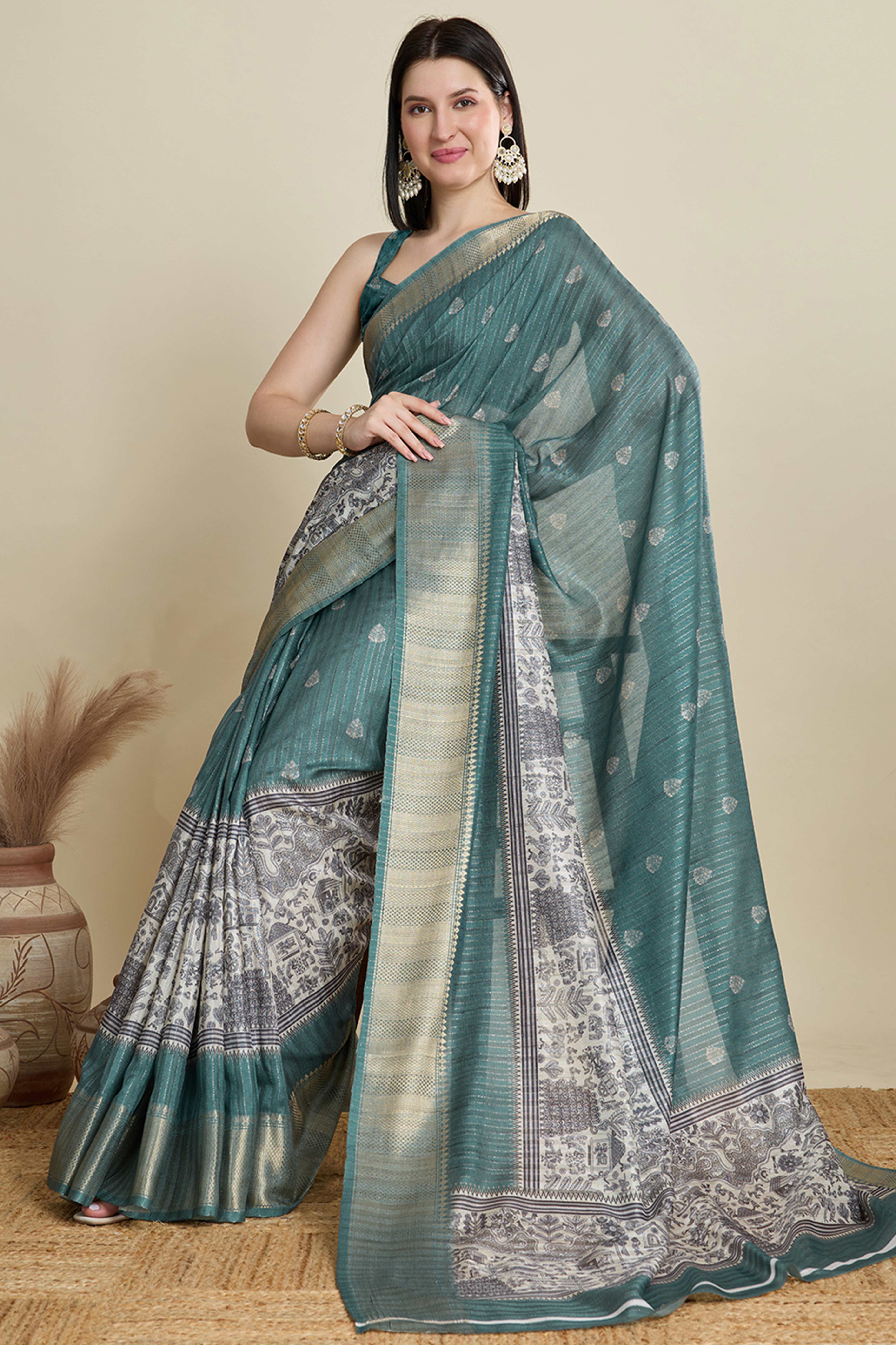 Sea Green Cotton Blend Saree Featuring Floral Prints and a Festive Zari Border Accent
