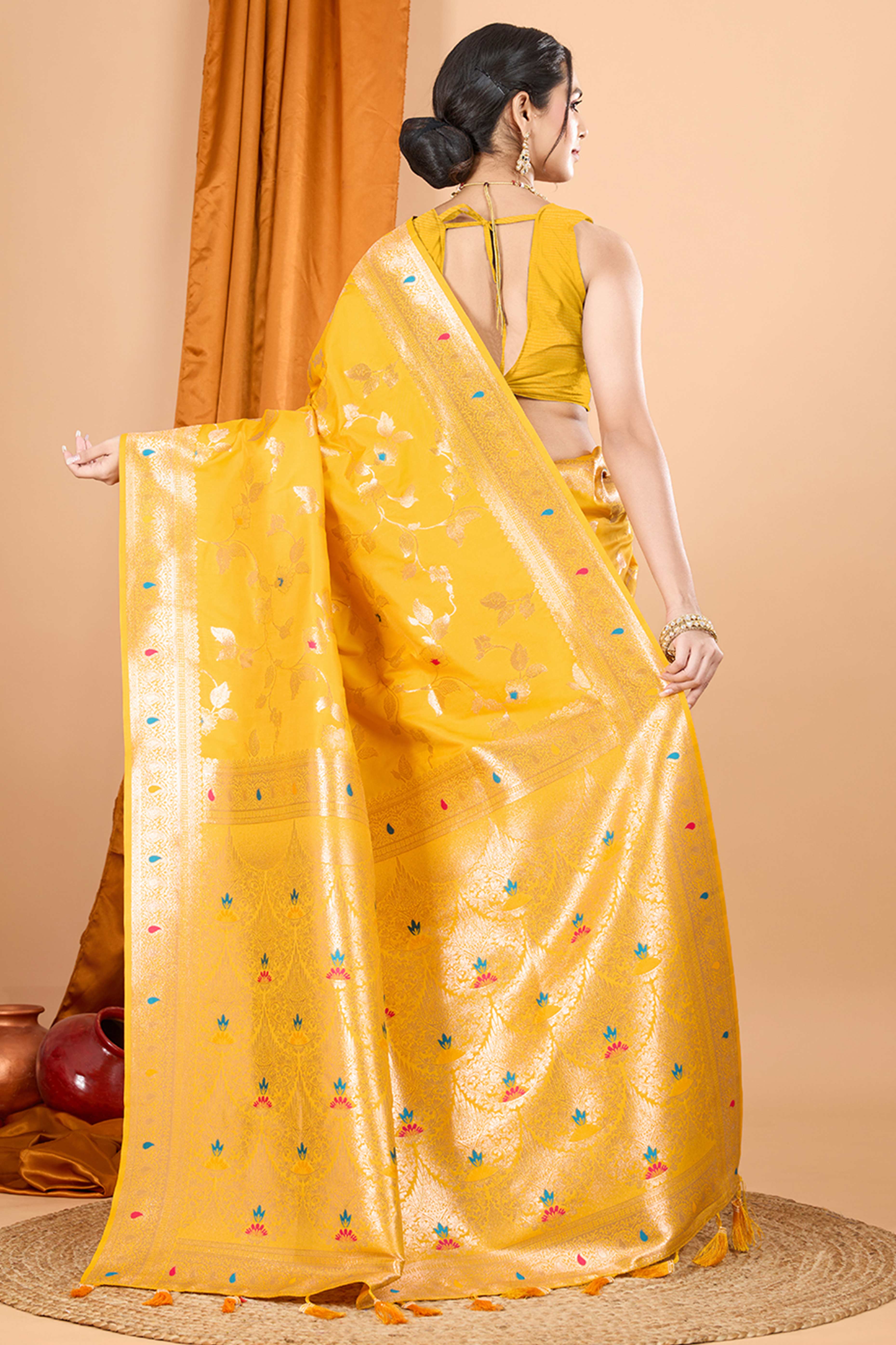 Yellow Banarasi Silk Saree With Exquisite Floral Zari Weaving and Elegant Tassels