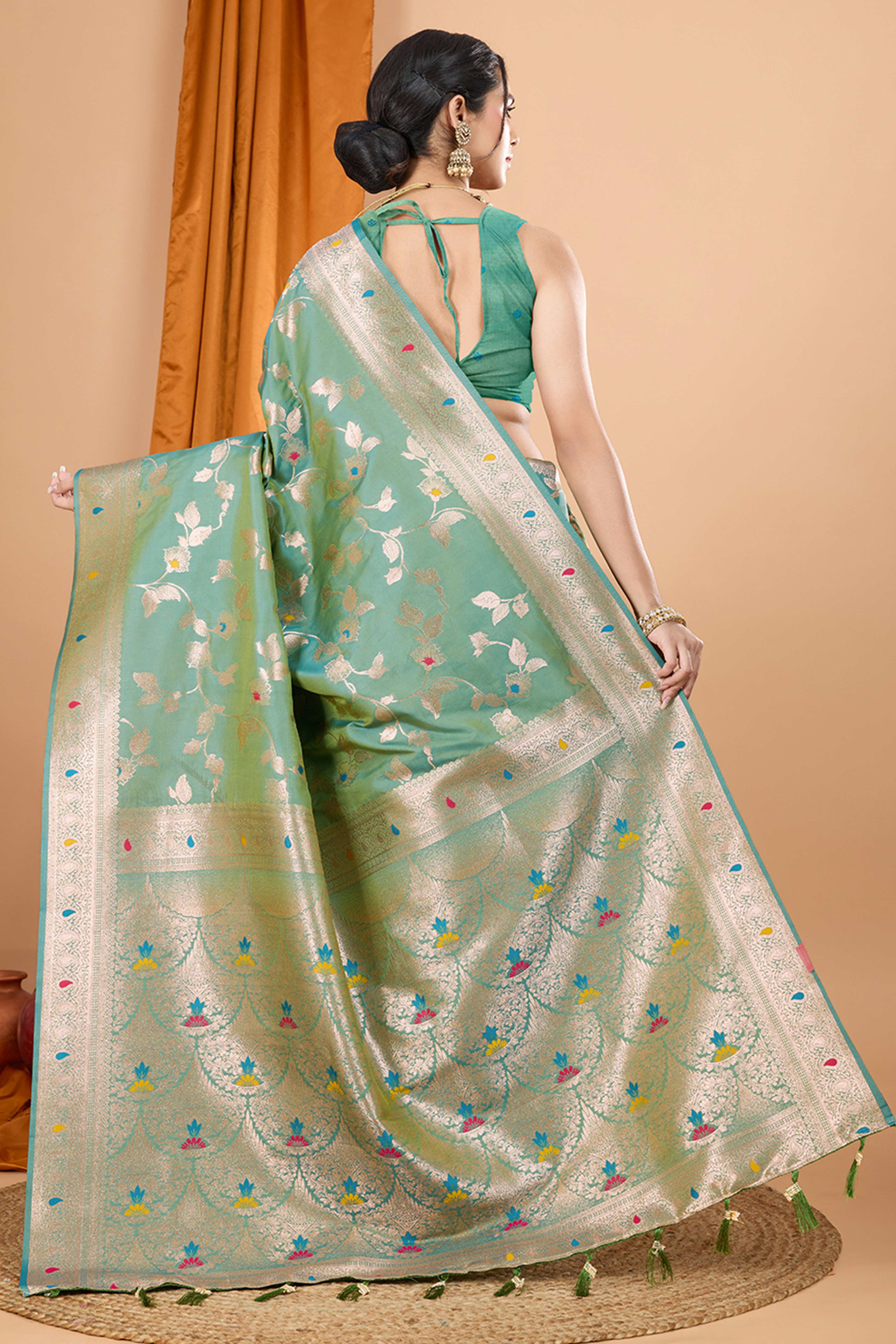 Rama Green Banarasi Silk Saree With Exquisite Floral Zari Weaving and Elegant Tassels