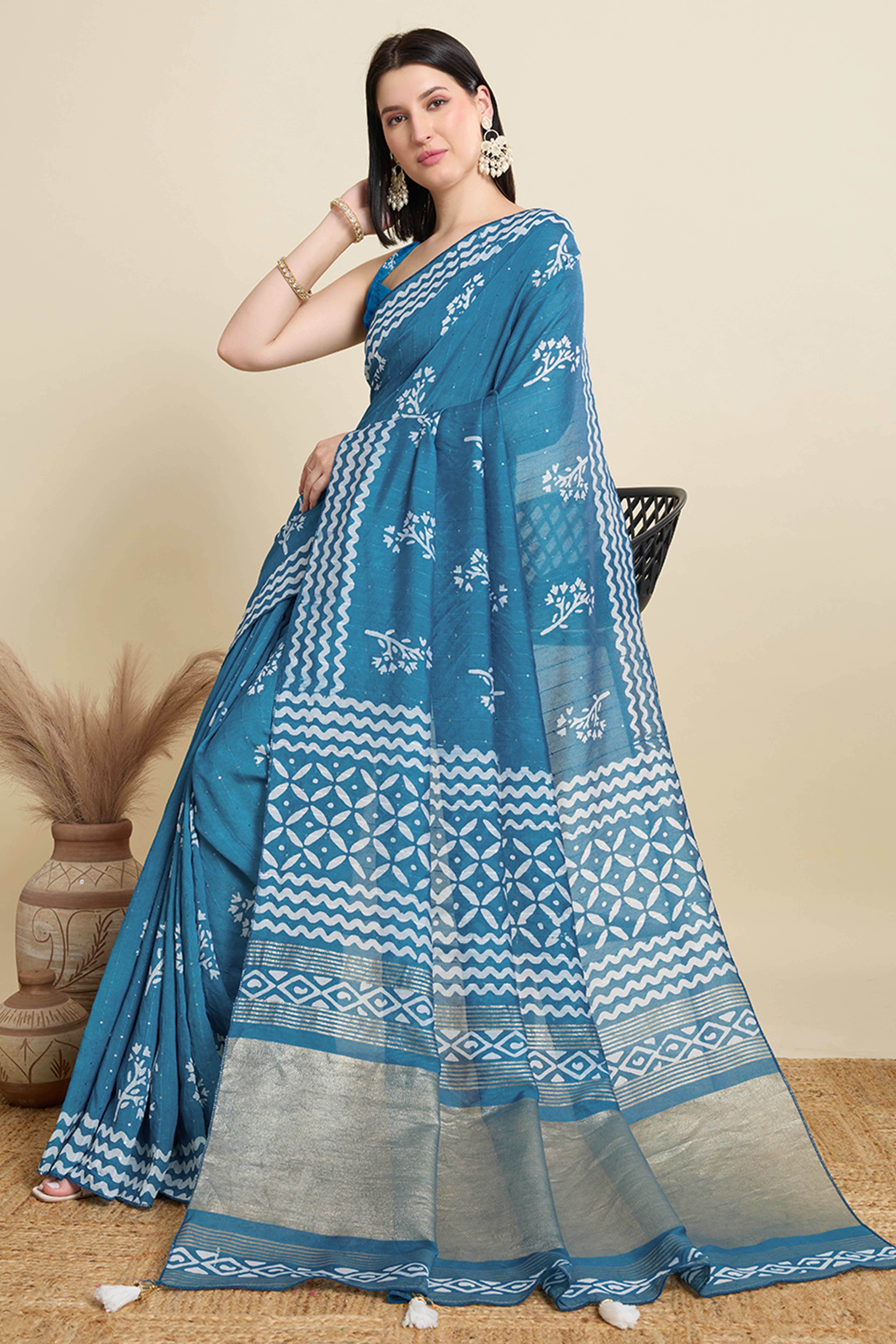 Blue Cotton Blend Saree Featuring Floral Prints and Elegant Sequins Work Accents