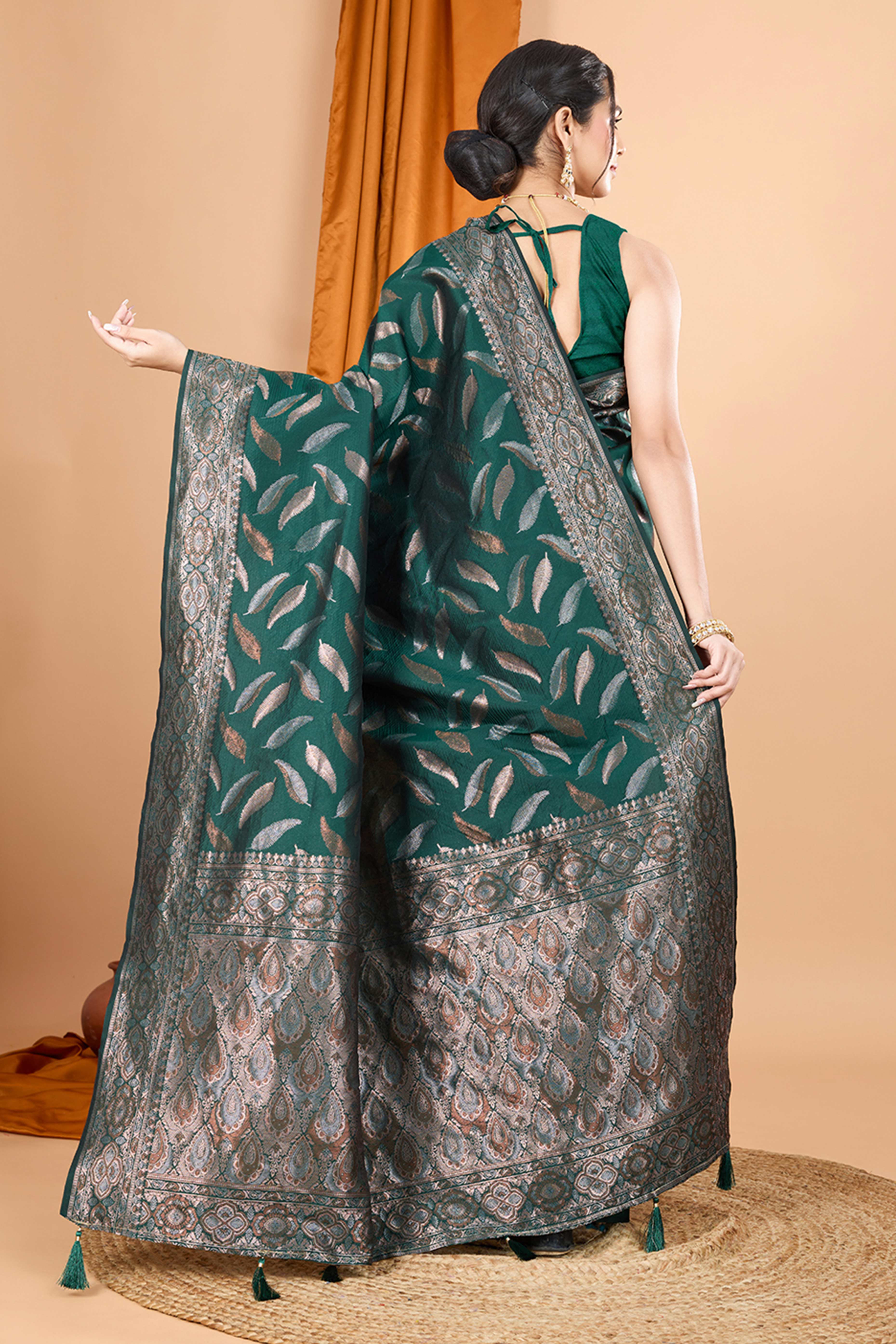 Green Pure Silk Saree With Intricate Leaf Pattern Zari Weaving & Graceful Tassels