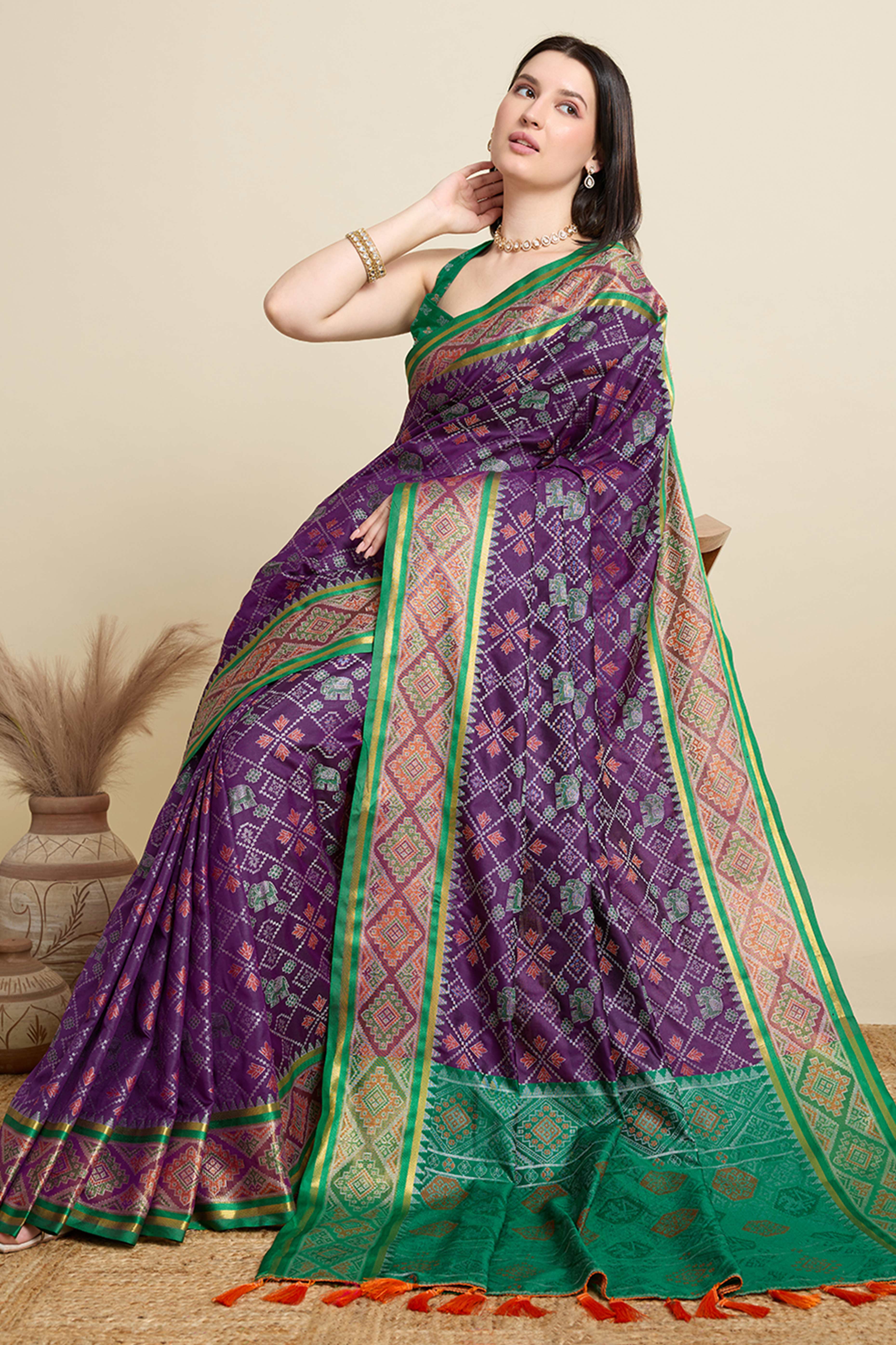 Purple Silk Blend Saree Featuring Patola Prints and a Detailed Weaving Border