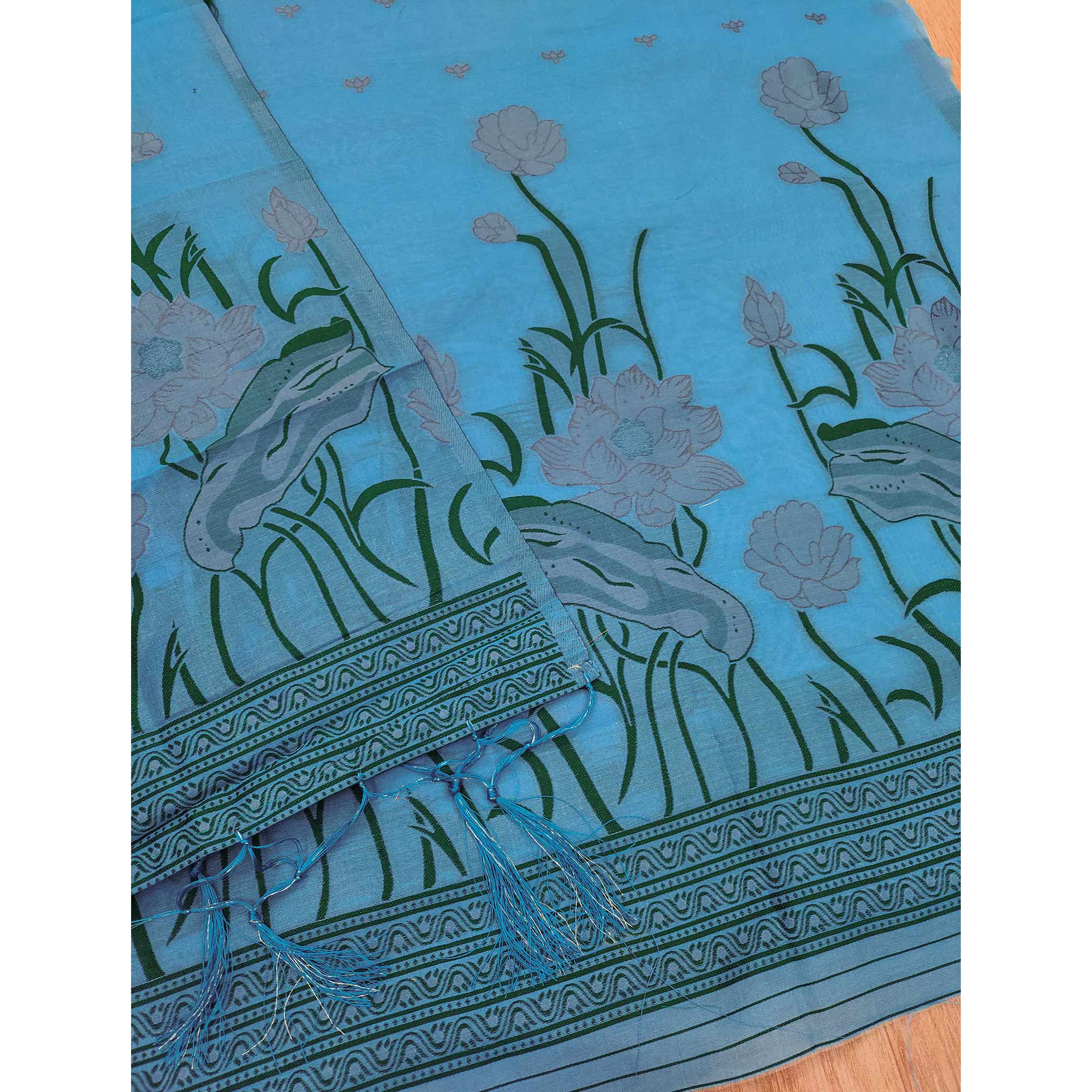 Blue Ethnic Dress Material Showcasing Handloom Style Floral Zari Weaving