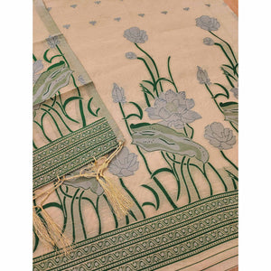 Chikoo Ethnic Dress Material Showcasing Handloom Style Floral Zari Weaving