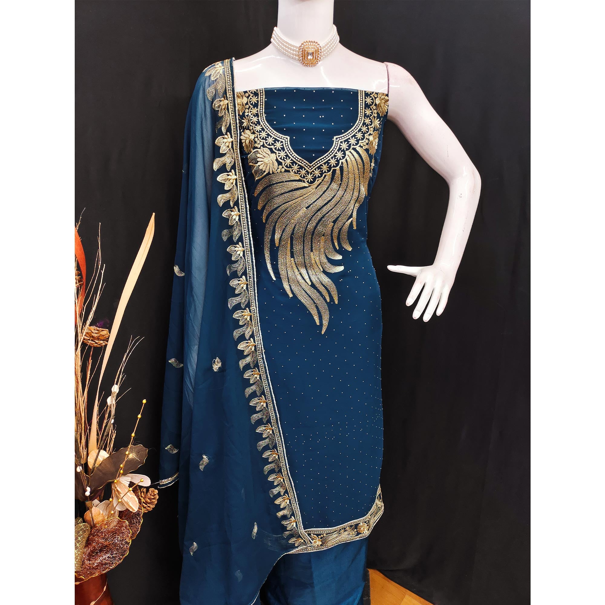 A Mesmerizing Creation Morpich Blue Floral Embroidery With Stone Work Georgette Dress Material