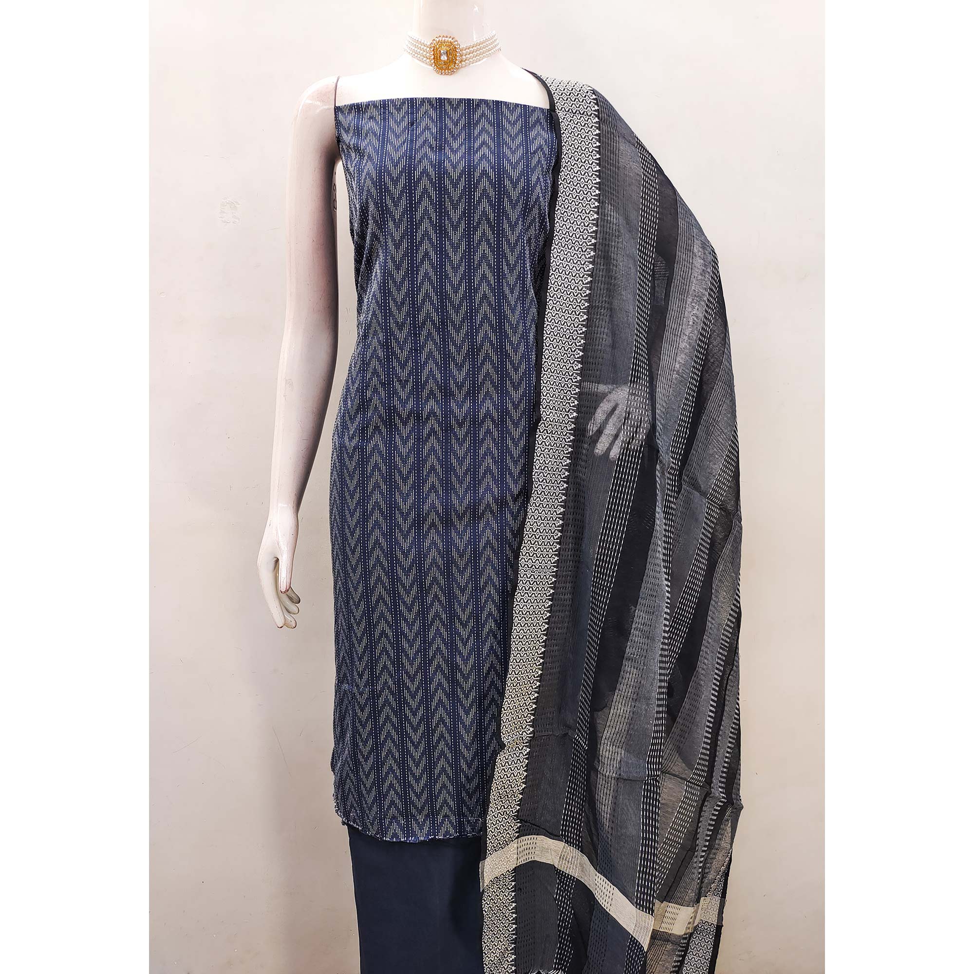 Redefine Elegance With This Navy Blue Chevron Woven Pattern Cotton Blend Dress Material