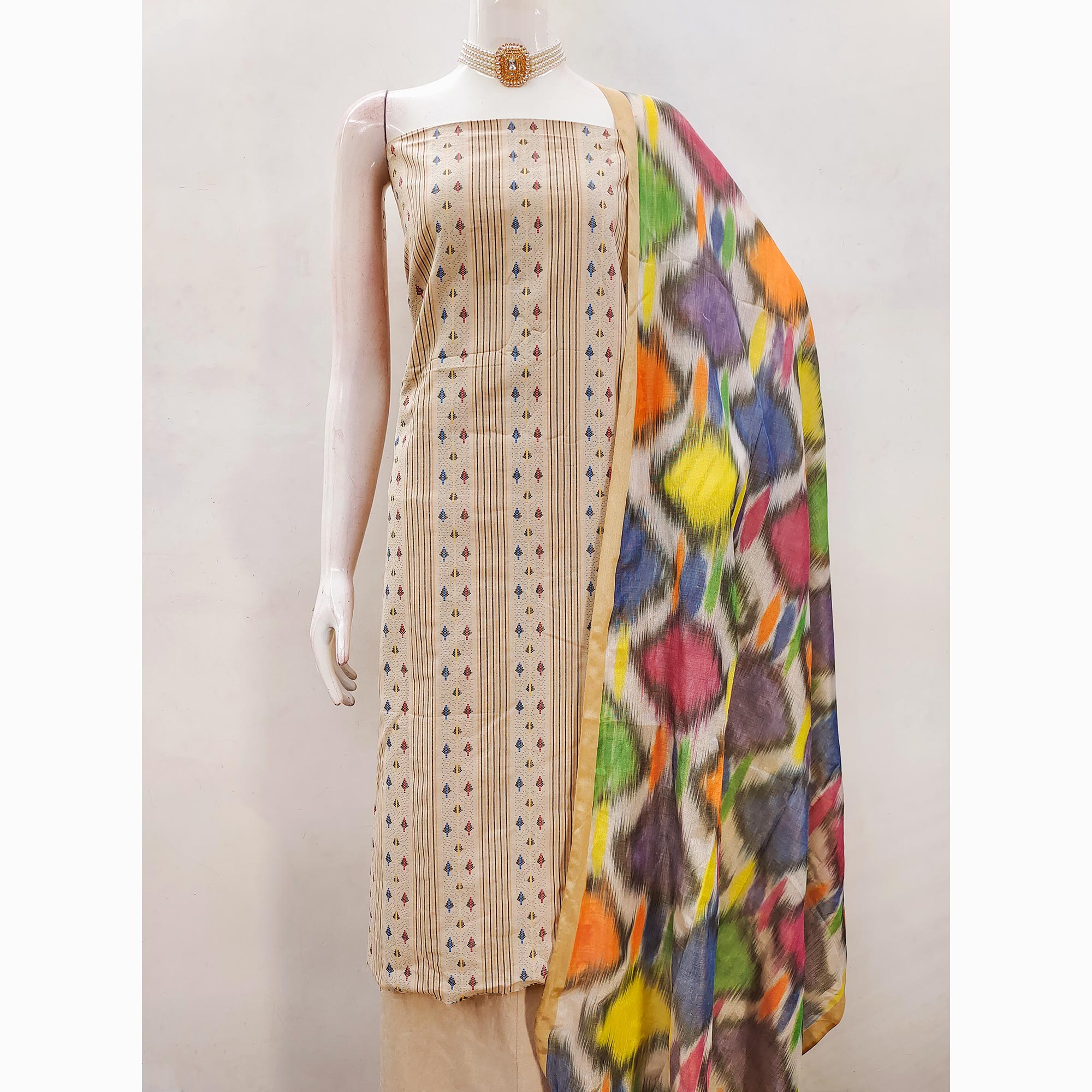 Make a Statement With Chikoo Woven Cotton Blend Dress Material