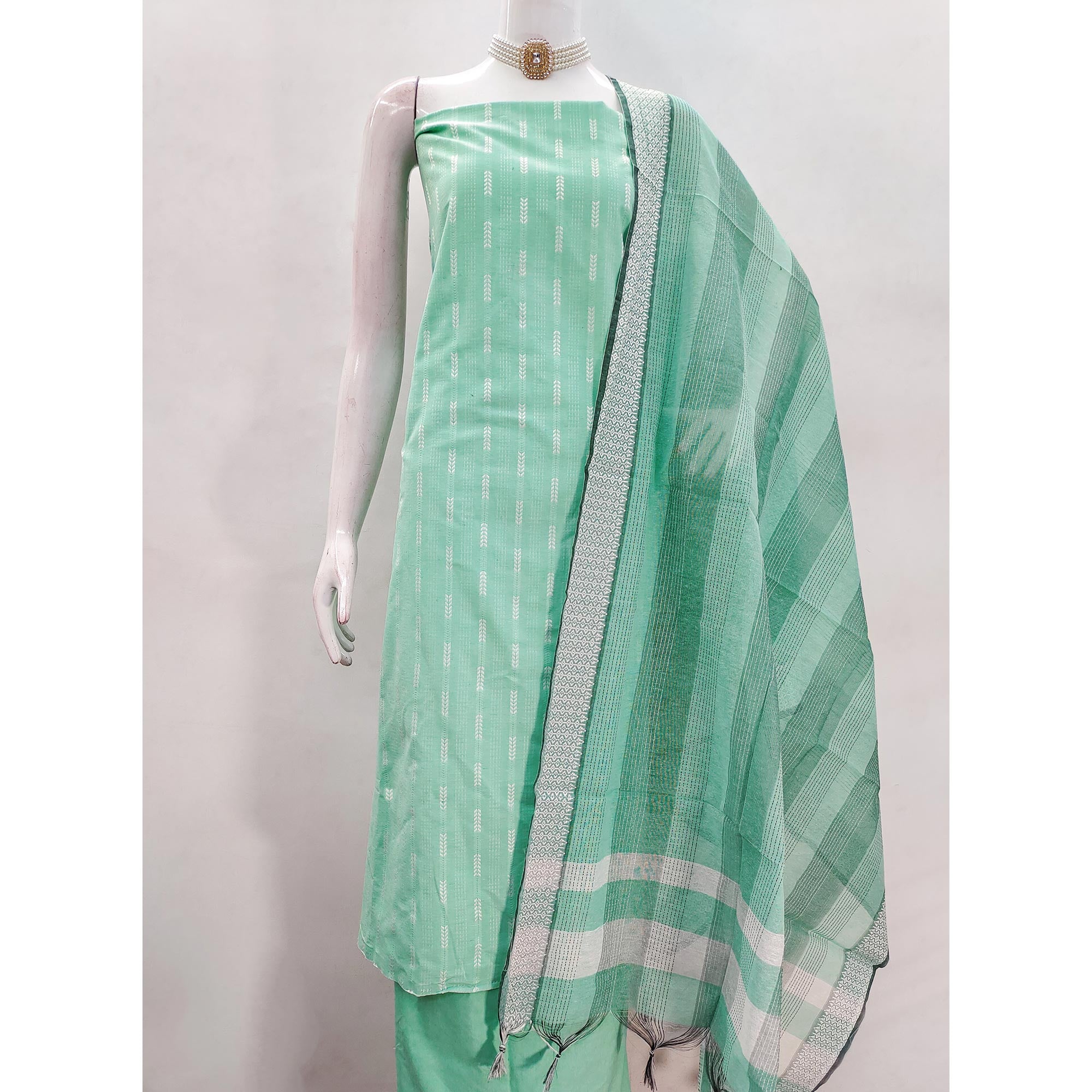 Refreshing Turquoise Woven Texture Dress Material In Poly Cotton Blend