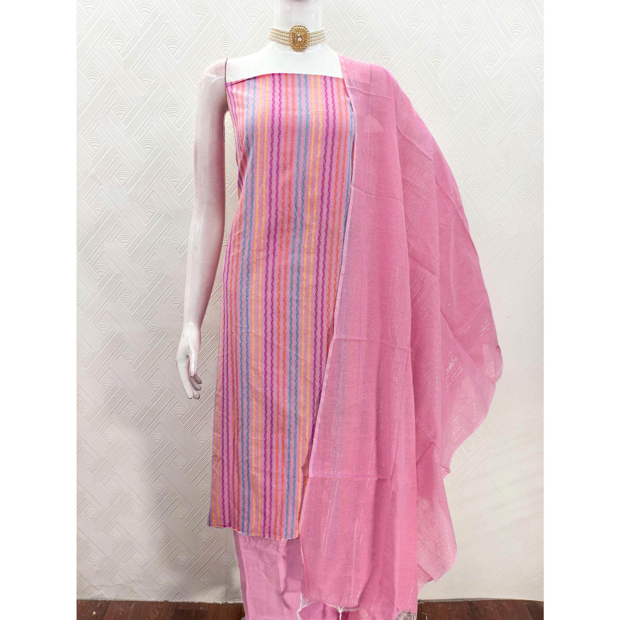 Pink Poly Cotton Blend Dress Material Highlighted With Striped Woven Work