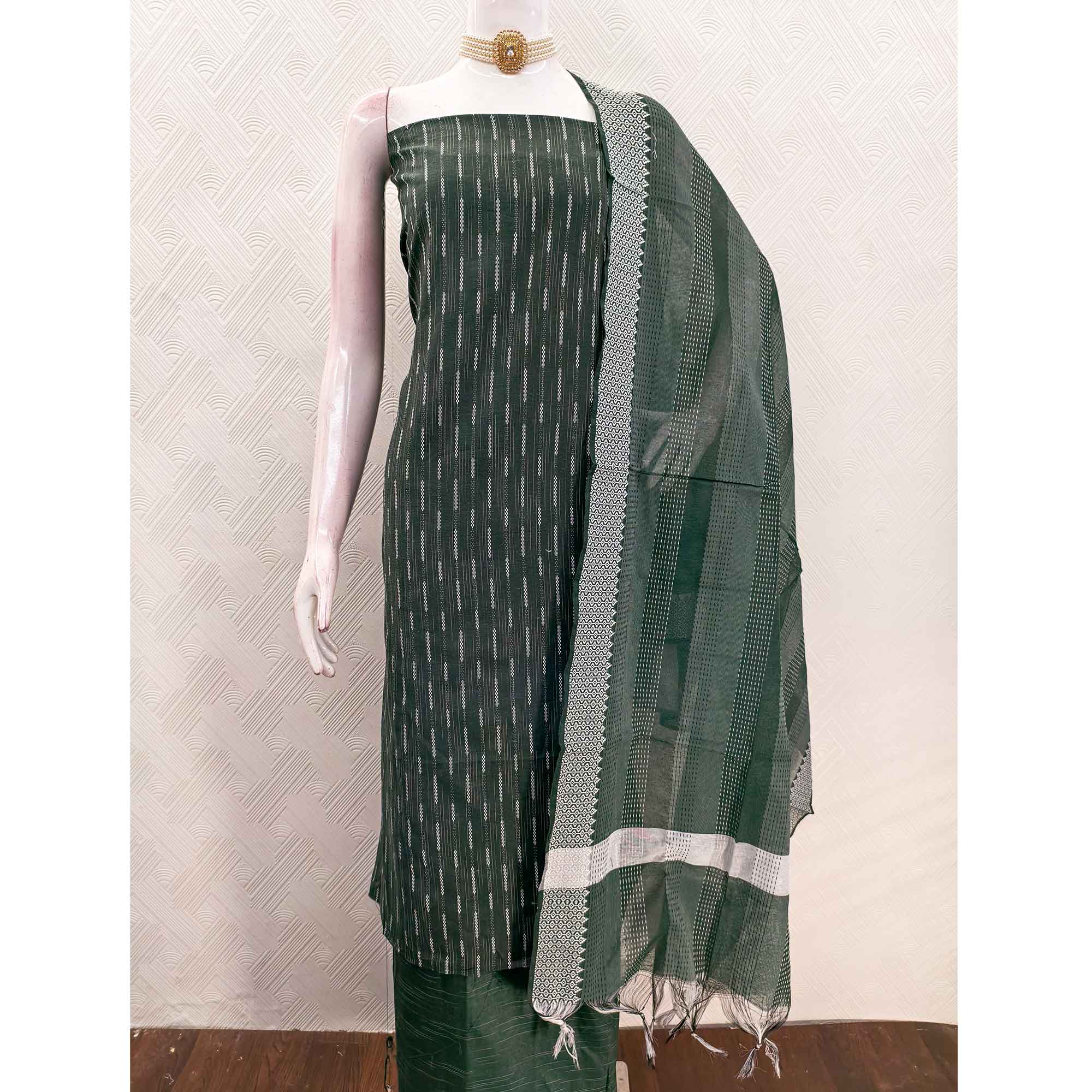 Green Poly Cotton Blend Dress Material Adorned With Striped Weaving Work