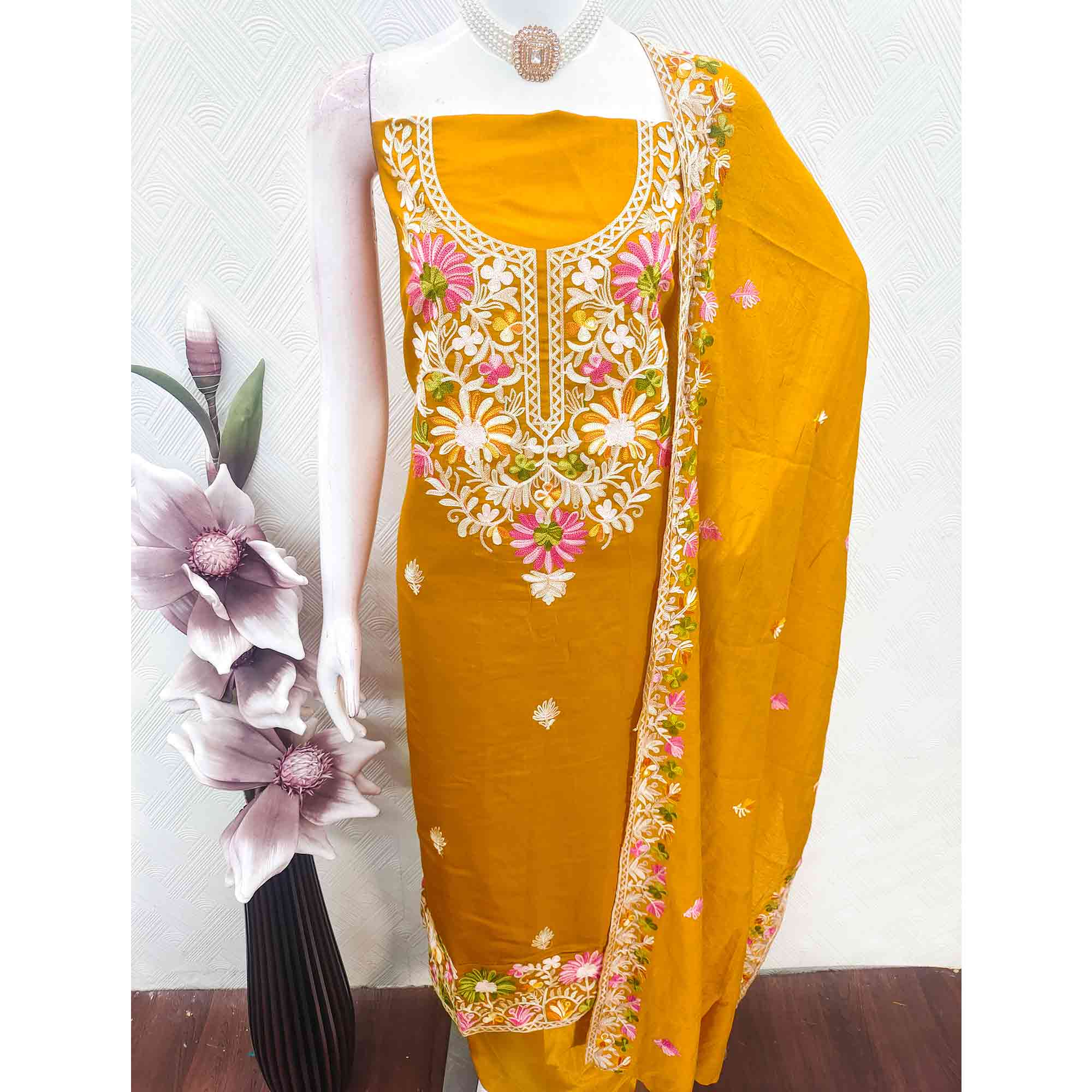 Dark Mustard Designer Roman Art Silk Dress Material Adorned With Floral Thread Embroidery Work