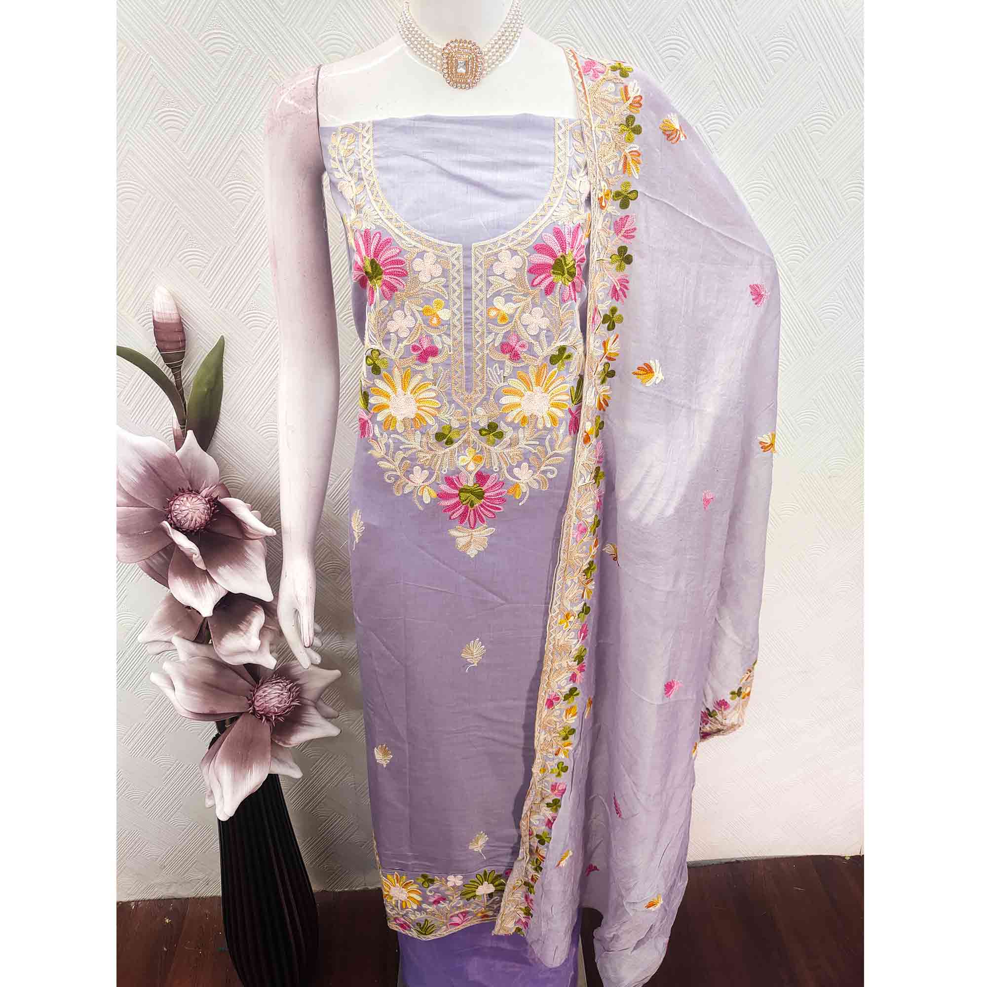 Lavender Designer Roman Art Silk Dress Material Adorned With Floral Thread Embroidery Work