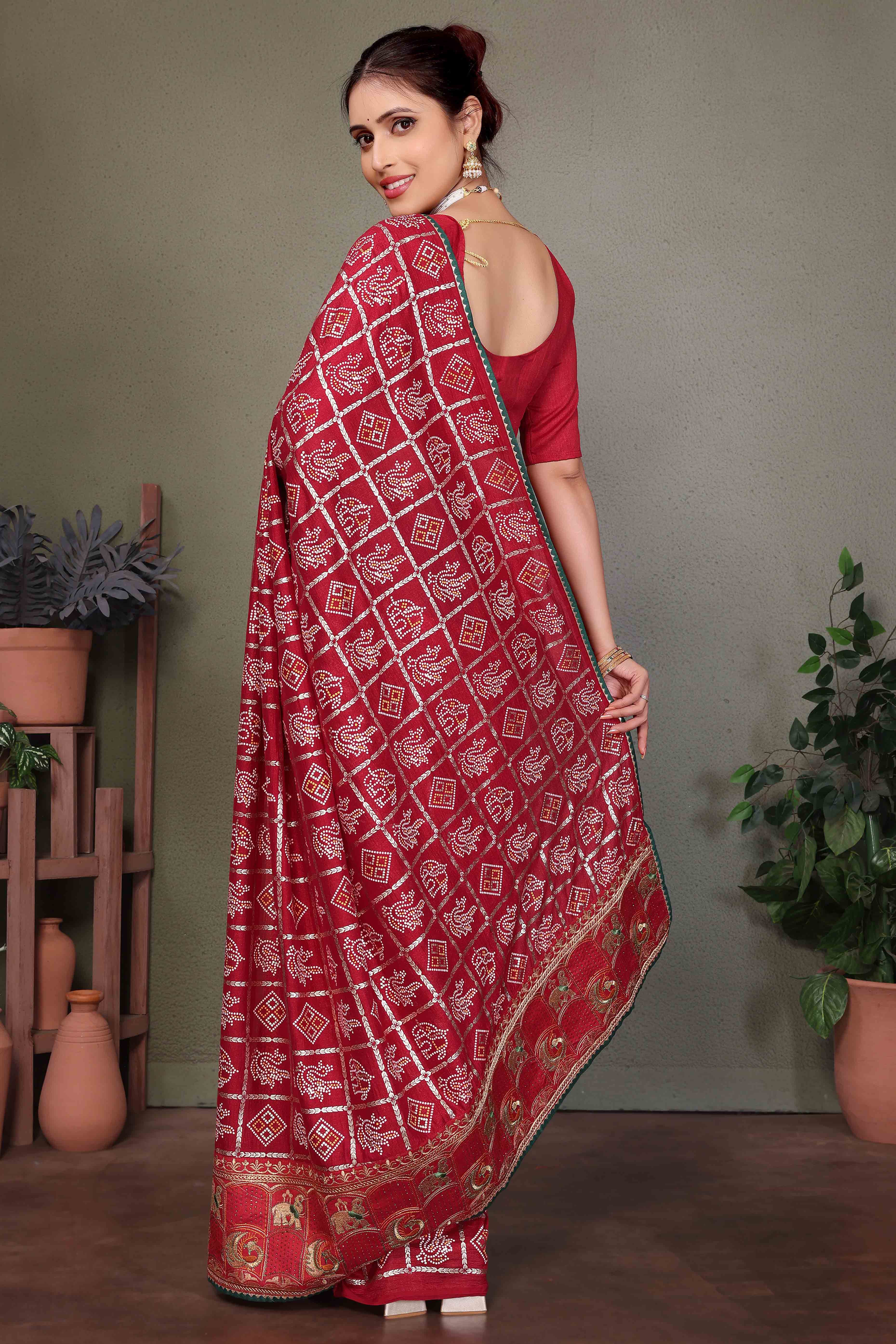 Maroon Vichitra Silk Saree Featuring Bandhani Patterns and Graceful Embroidered Borders