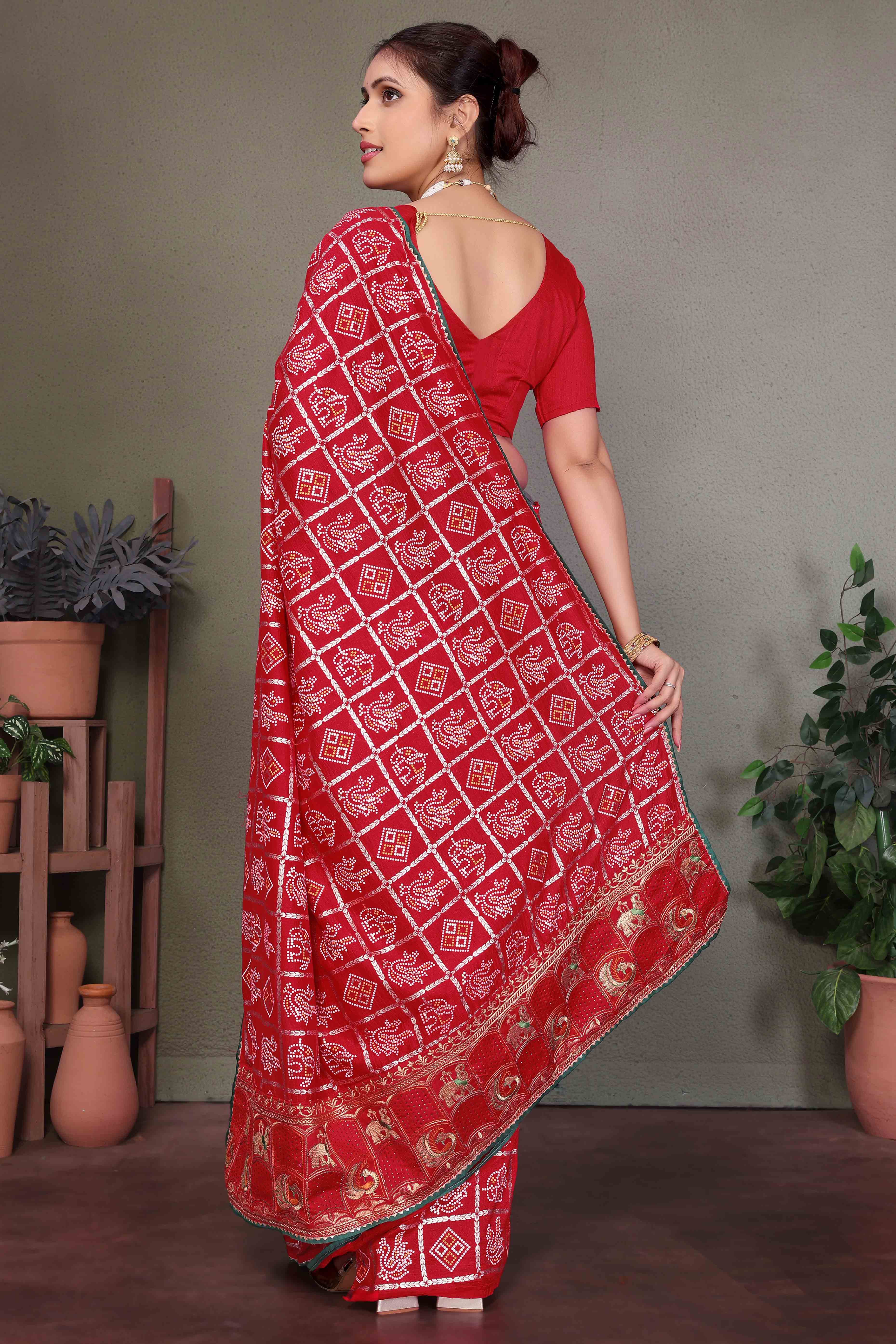 Red Vichitra Silk Saree Featuring Bandhani Patterns and Graceful Embroidered Borders
