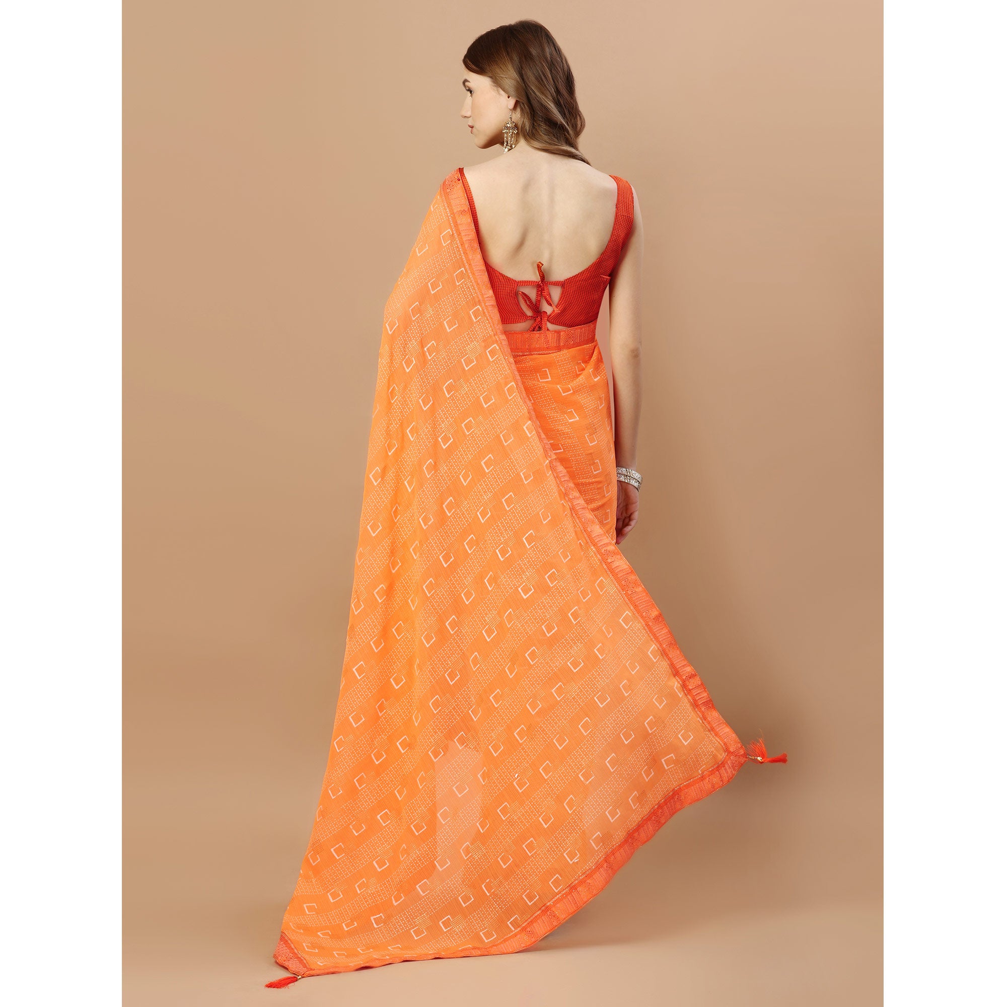 Orange Foil Printed Chiffon Saree With Lace Border