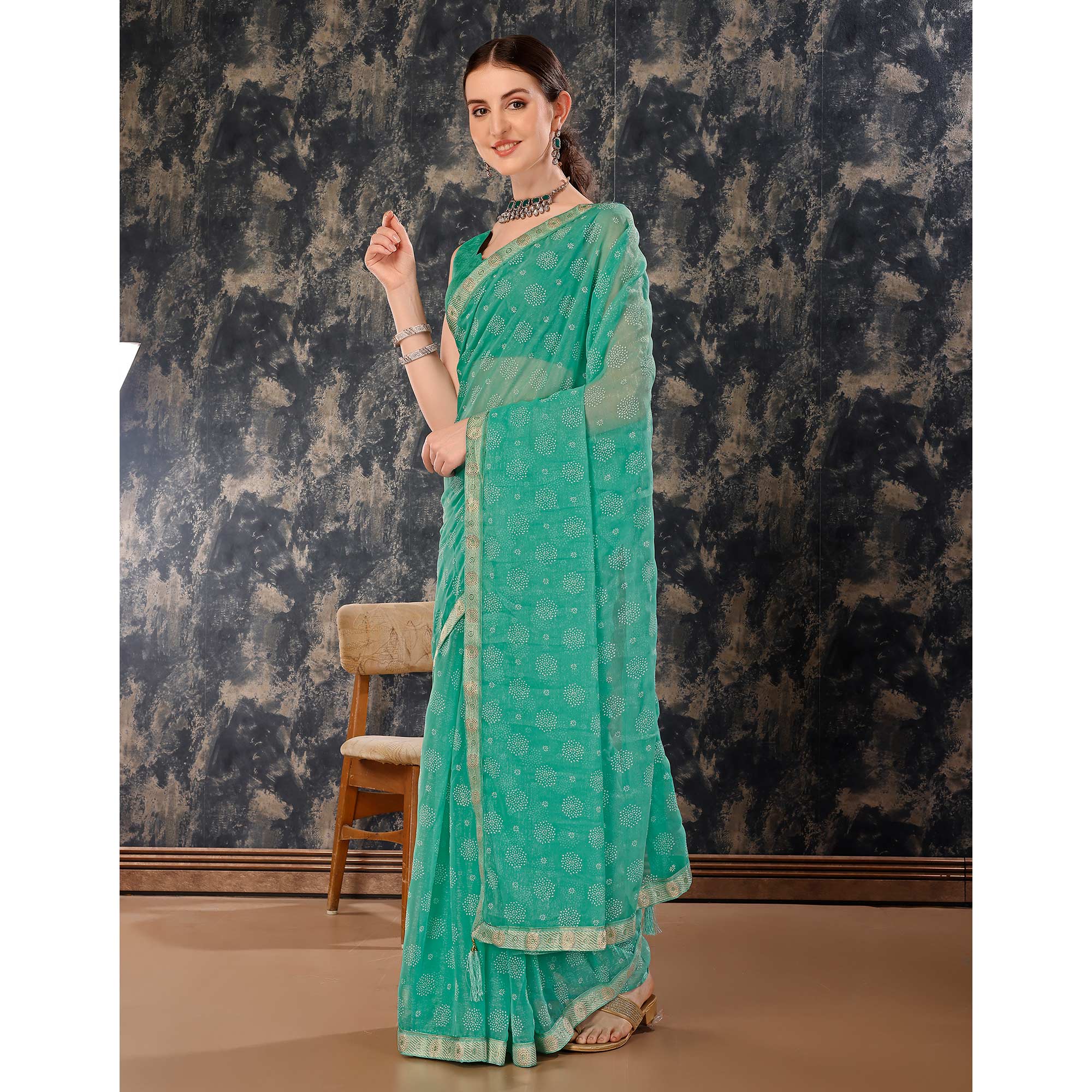 Turquoise Printed Chiffon Saree With Lace Border