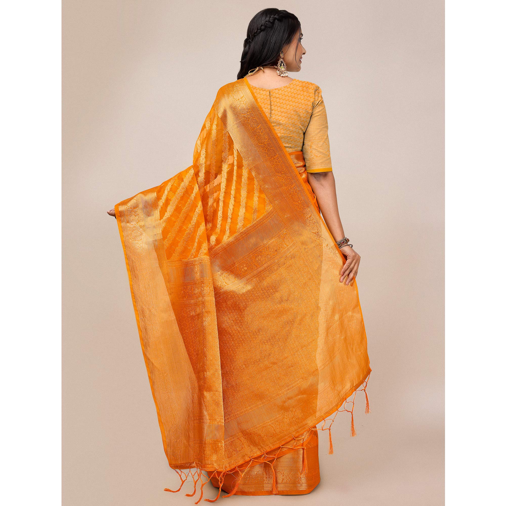 Orange Woven Organza Saree With Tassels