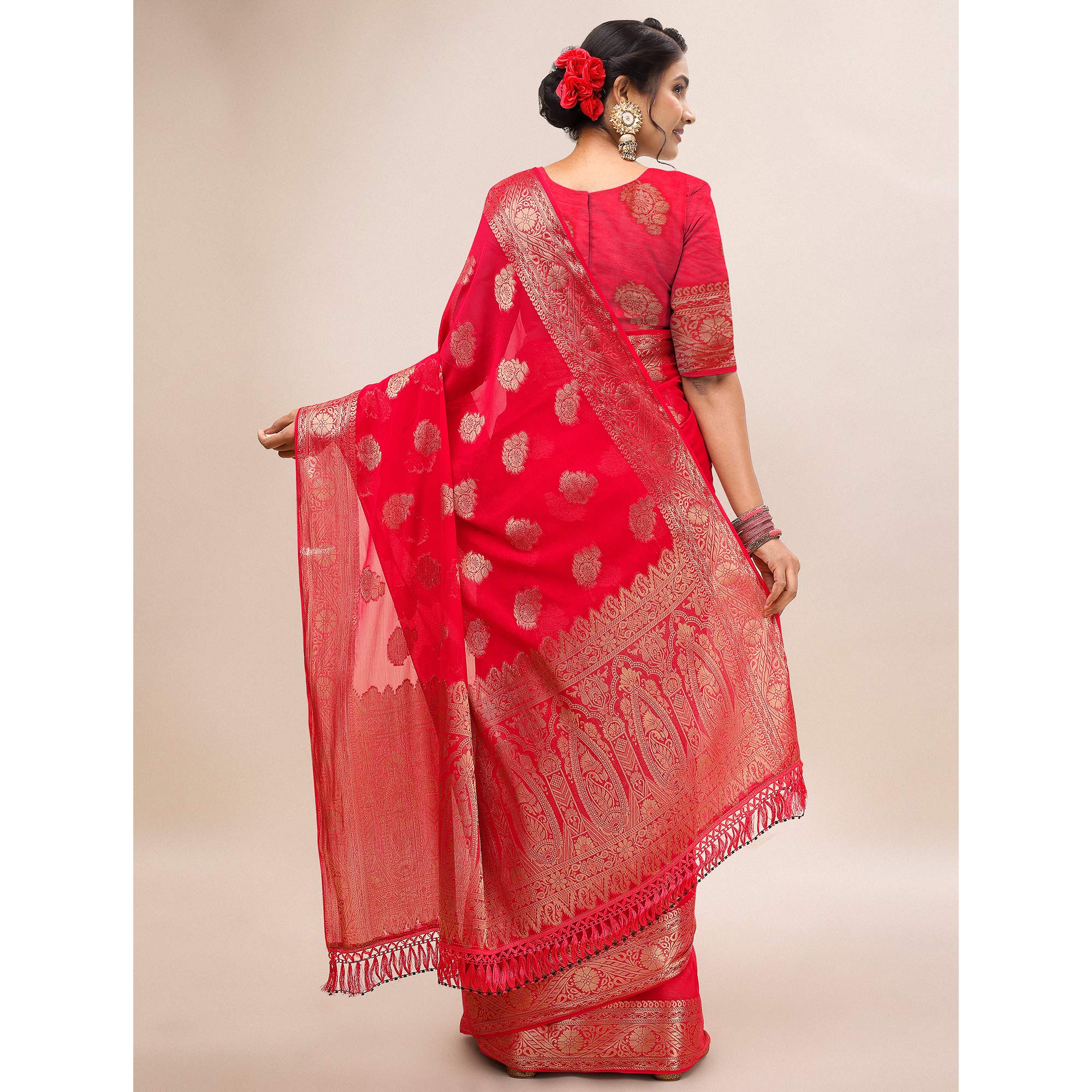 Pink Woven Chiffon Saree With Tassels