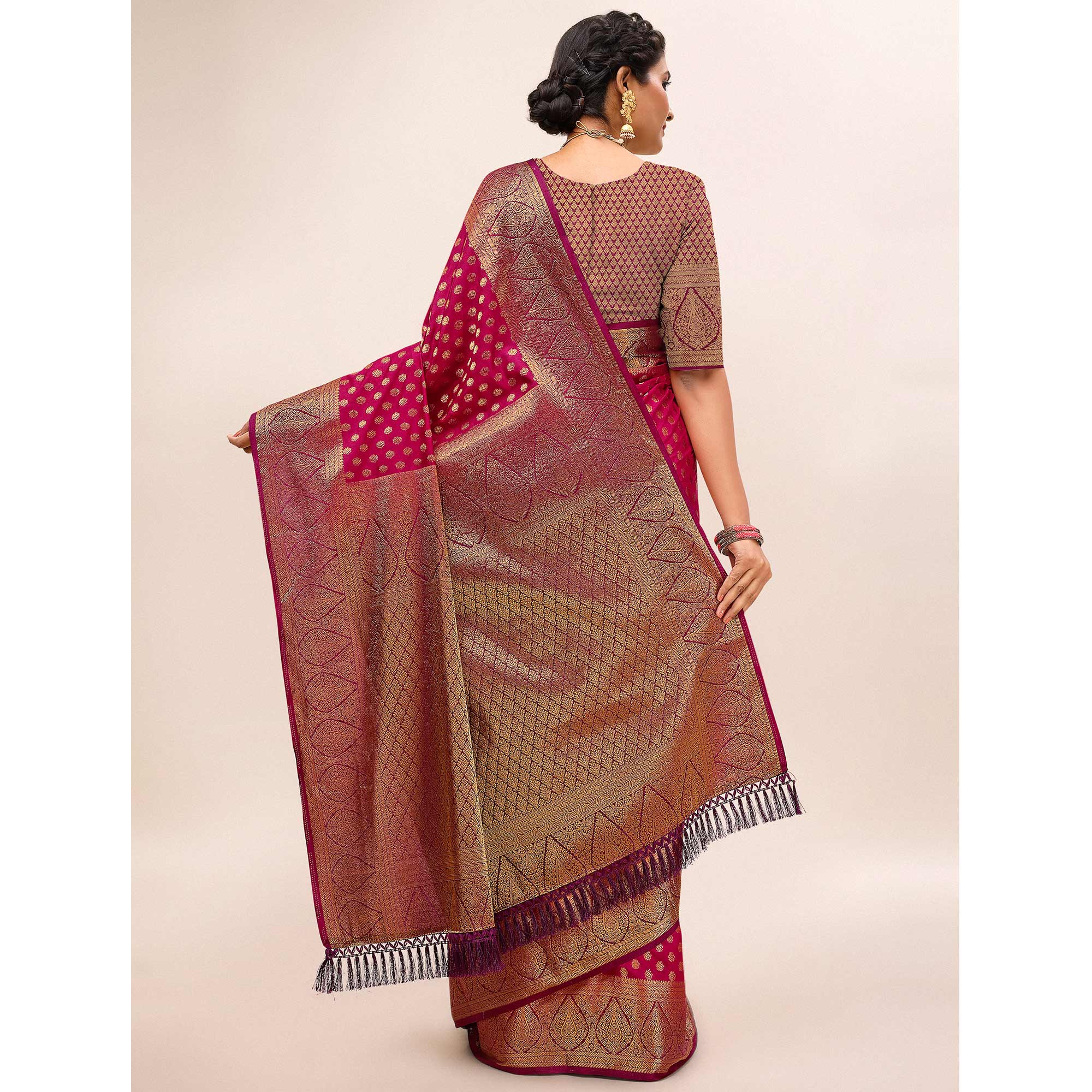 Rani Pink Woven Dola Silk Saree With Tassels
