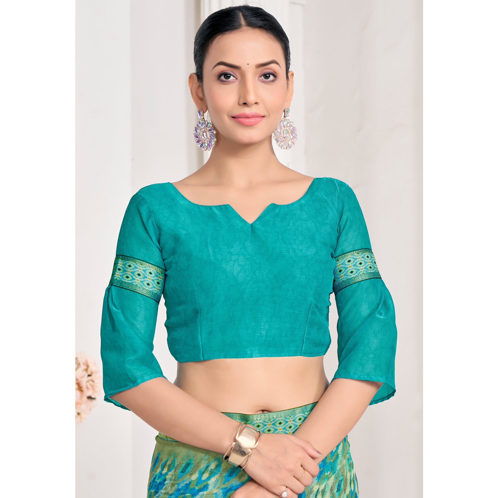 Turquoise Printed Chiffon Saree With Lace Border