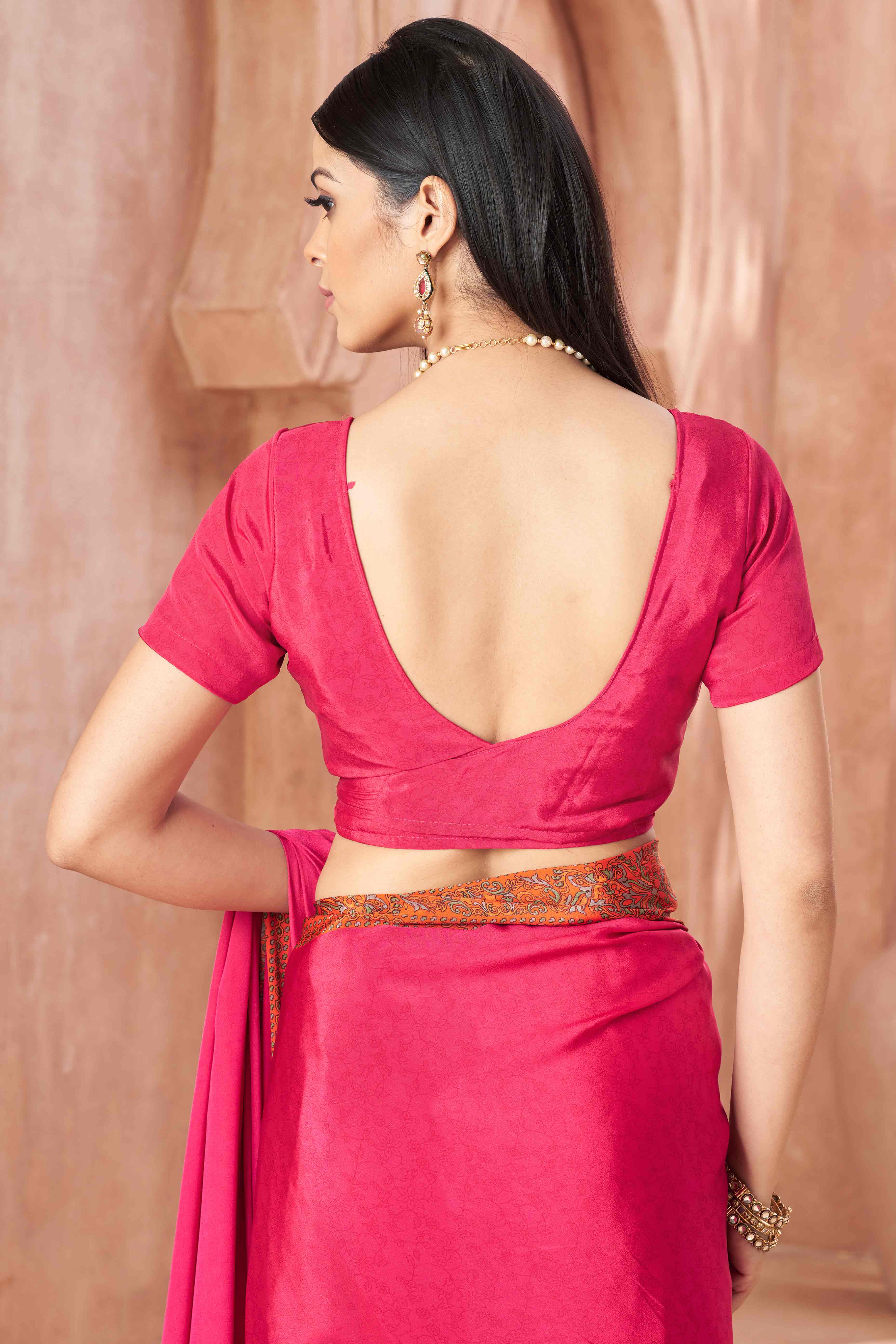 Pink Crepe Silk Saree with Elegant Floral Print Detailing