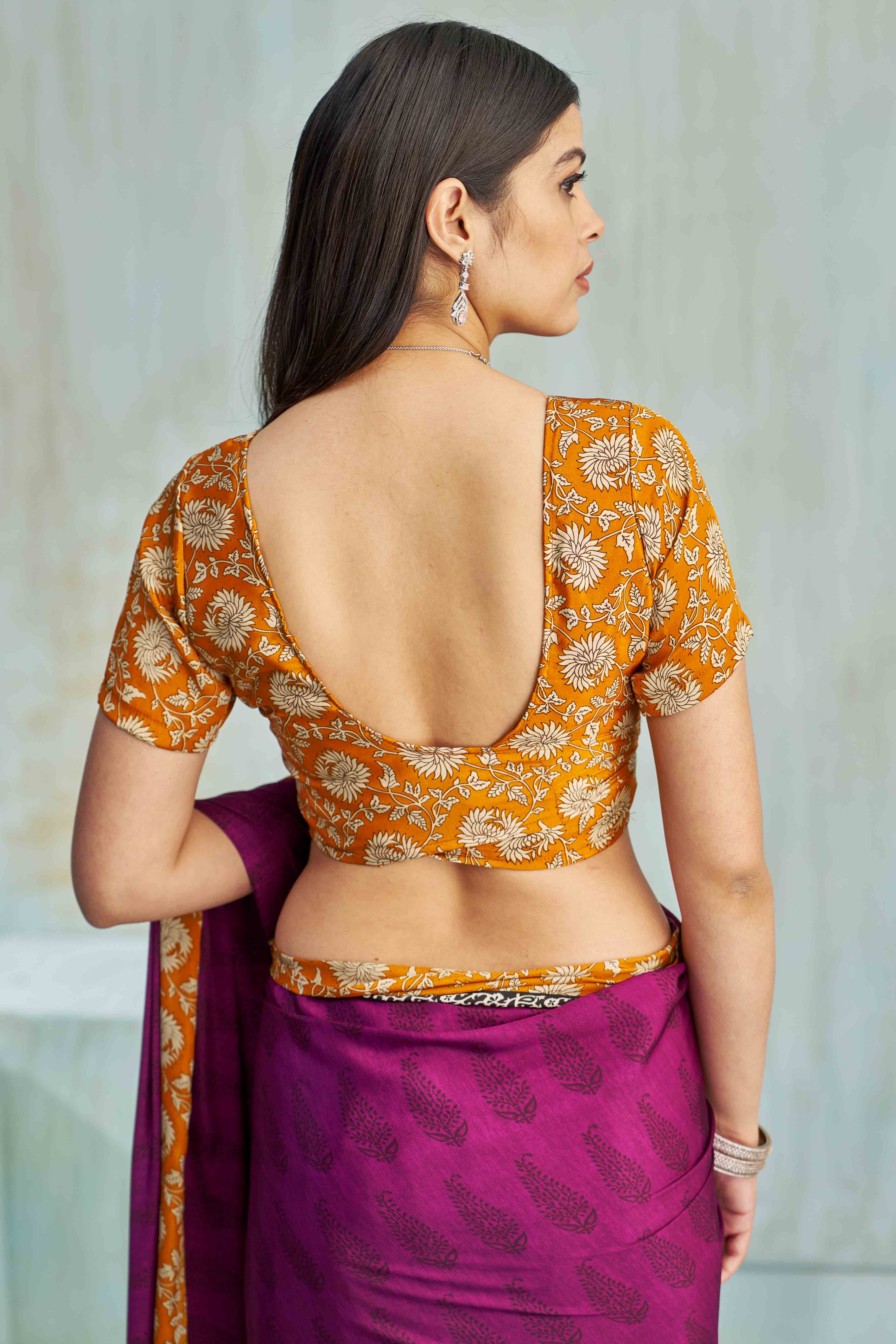 Dark Magenta Crepe Silk Saree Featuring Delicate Floral Print Work