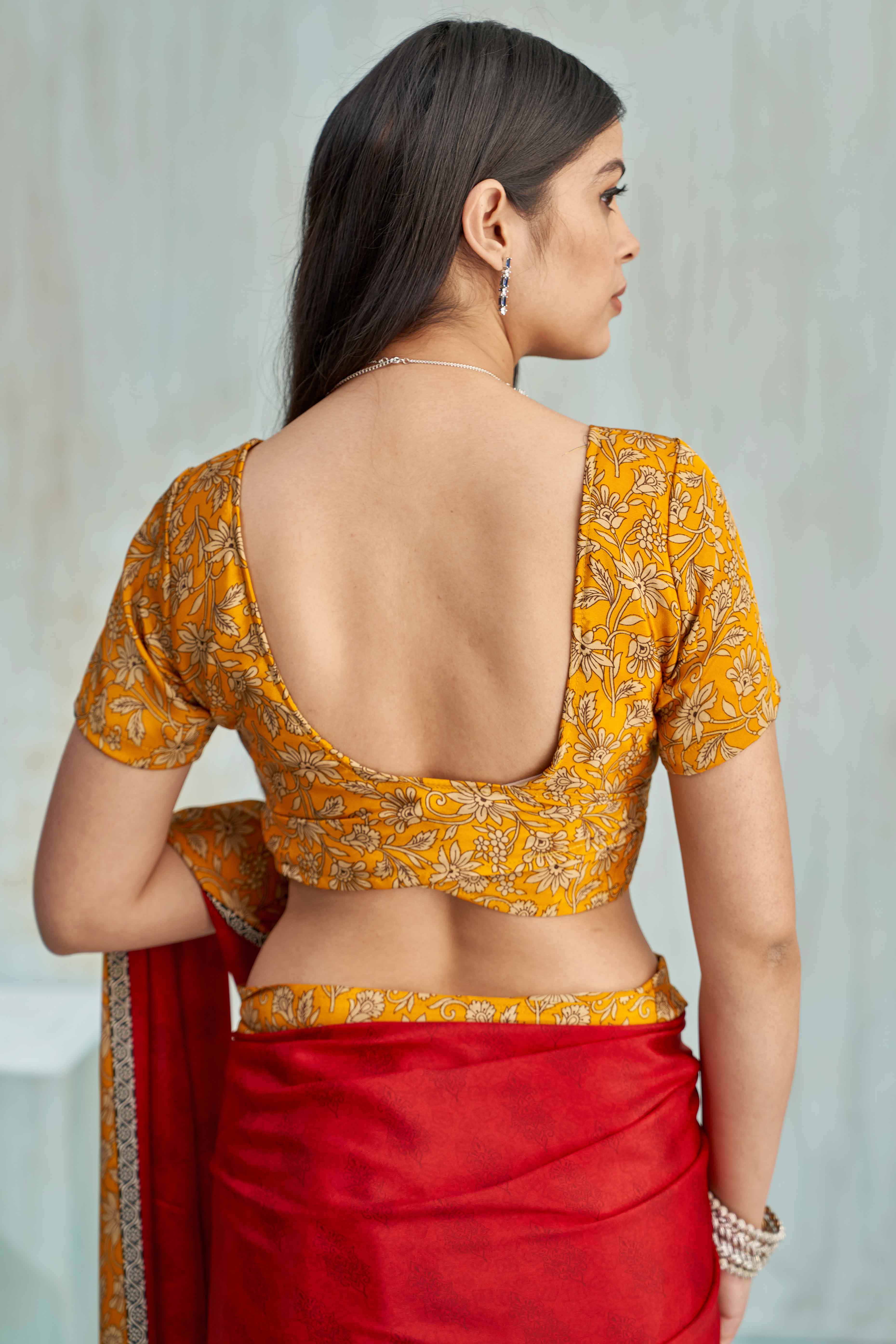 Red Crepe Silk Saree Featuring Delicate Floral Print Work