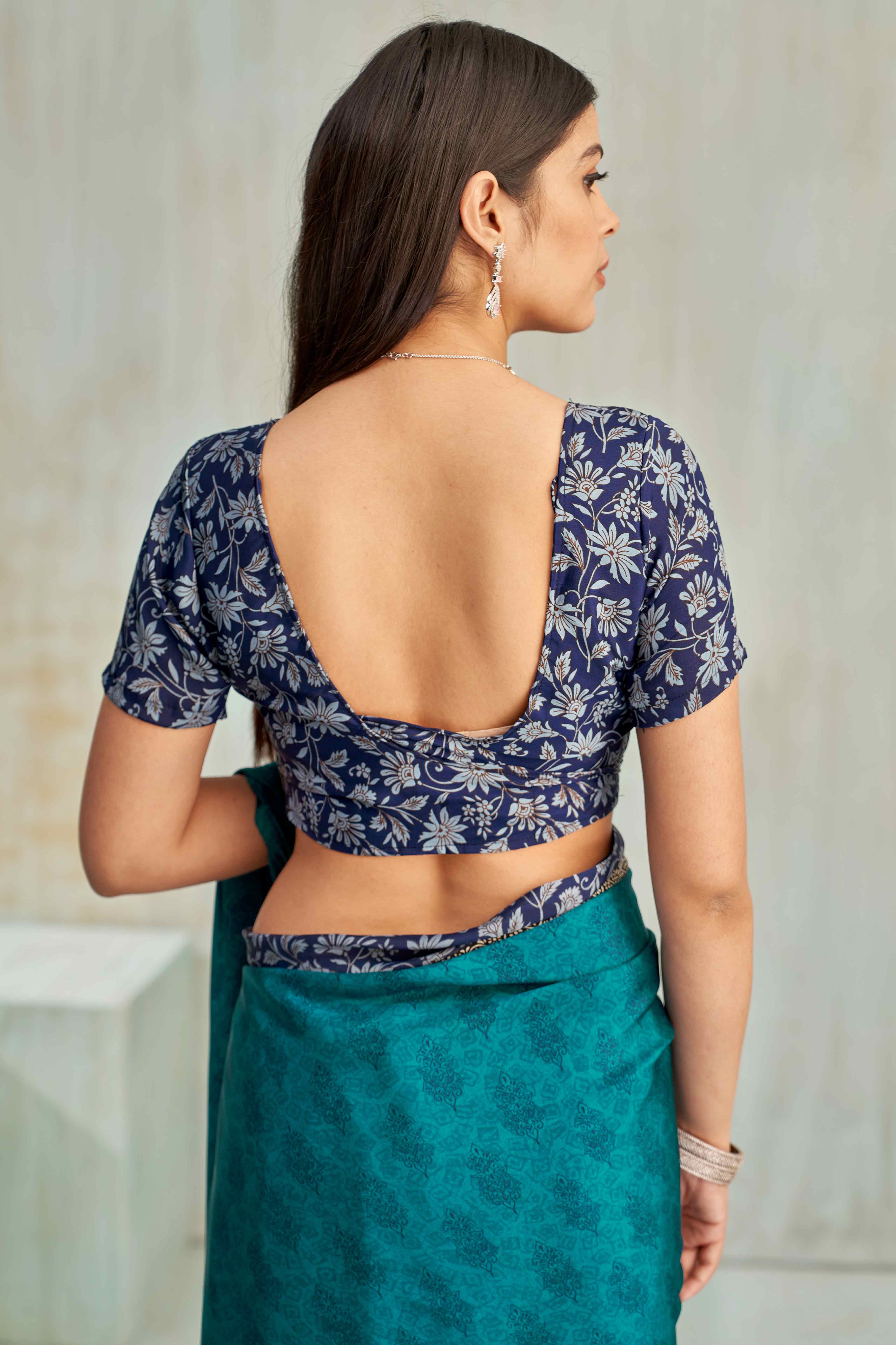 Teal Crepe Silk Saree Featuring Delicate Floral Print Work