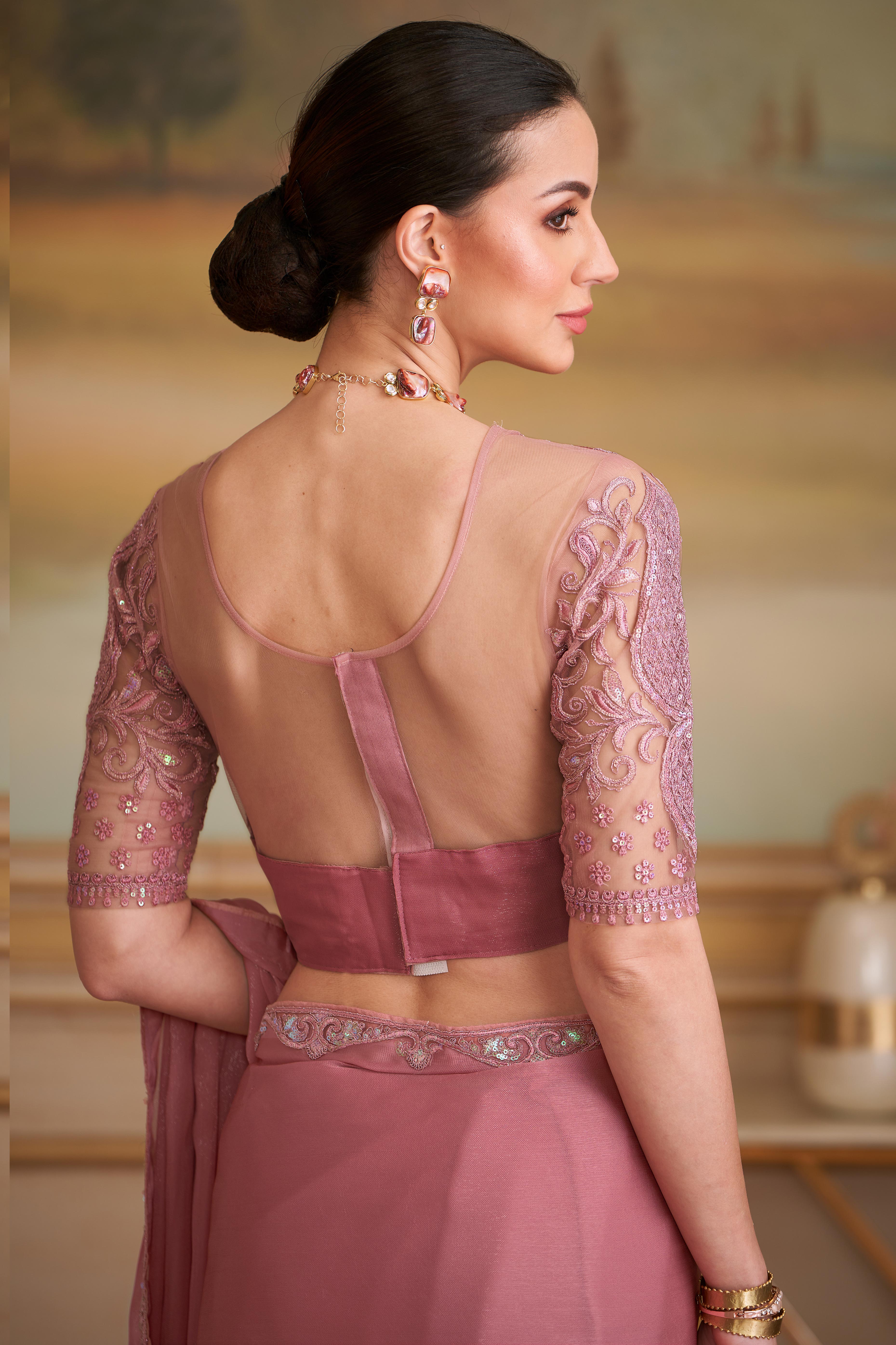 Graceful Onion Pink Sparkle Georgette Saree Adorned With Floral Sequins Embroidered Lace Border